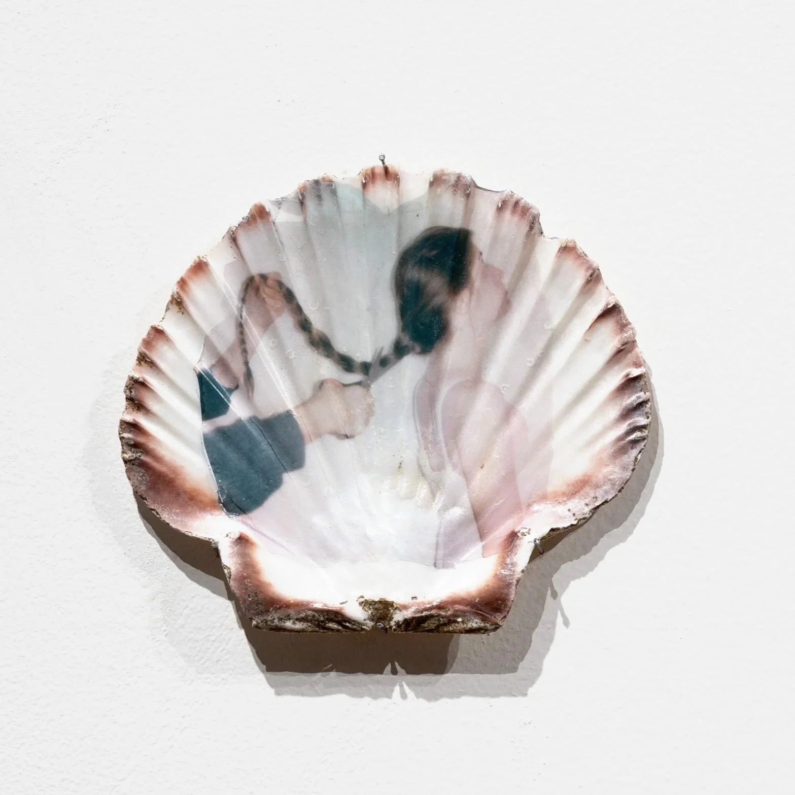 Shorn (2025) In Irish tellings of the legend, the moment of capture is during the intimate act of brushing hair, which is made transgressive by its exposure.  The severed hair references both mythic capture and historical practices in Ireland in whic