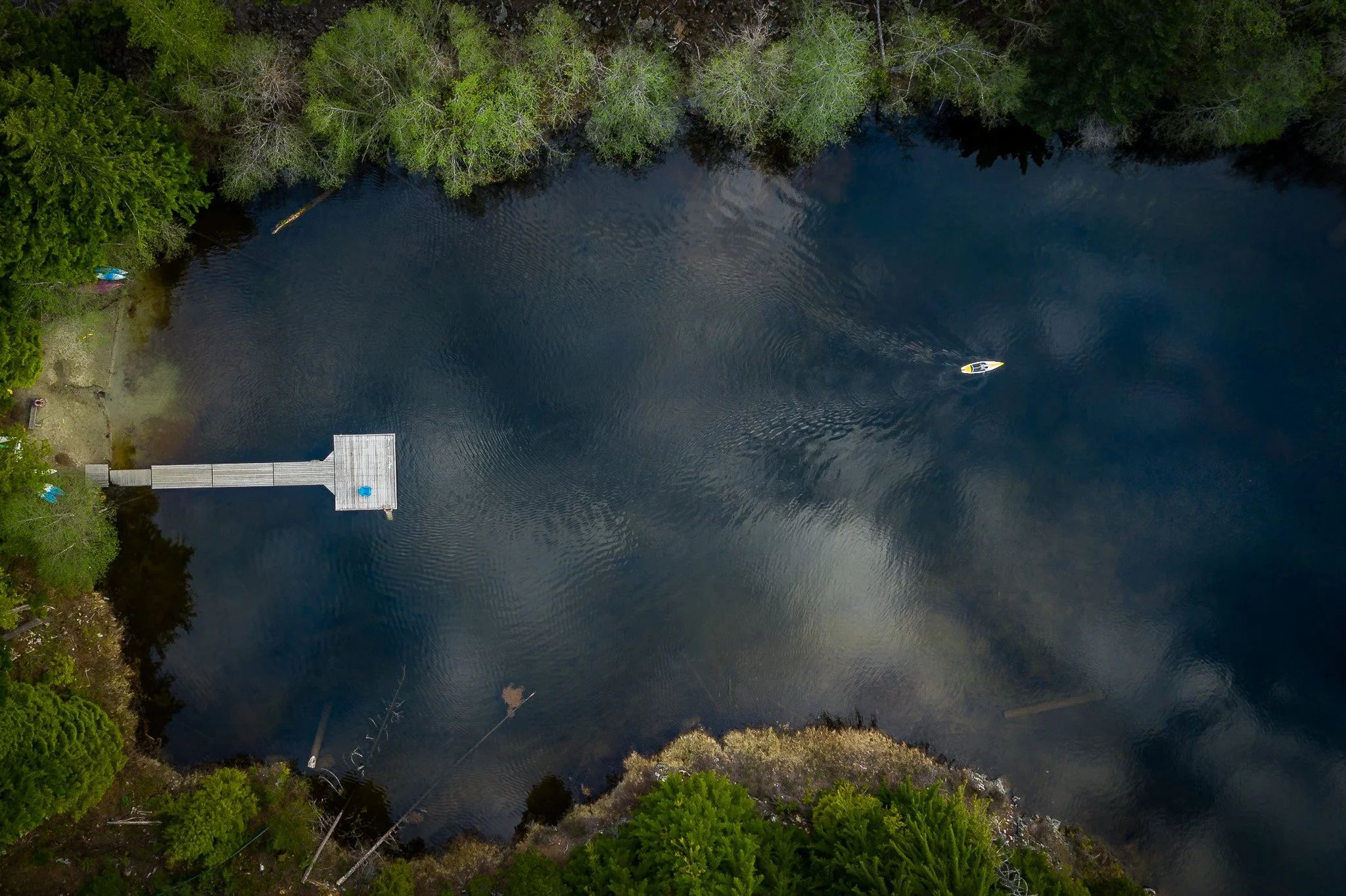 A paddleboarder on Alpha Lake in Whistler B.C. 