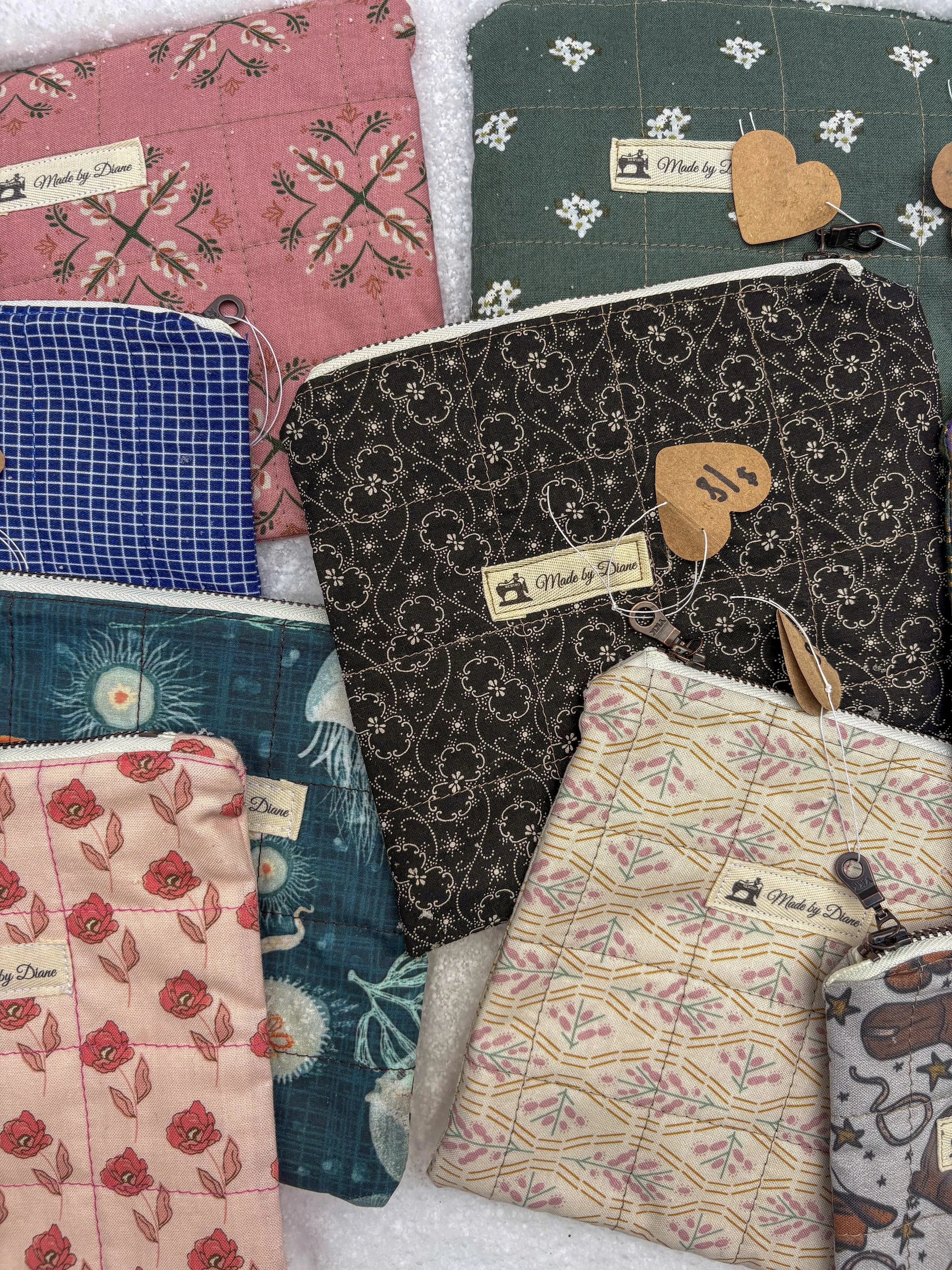 Quilted flat zipper pouch