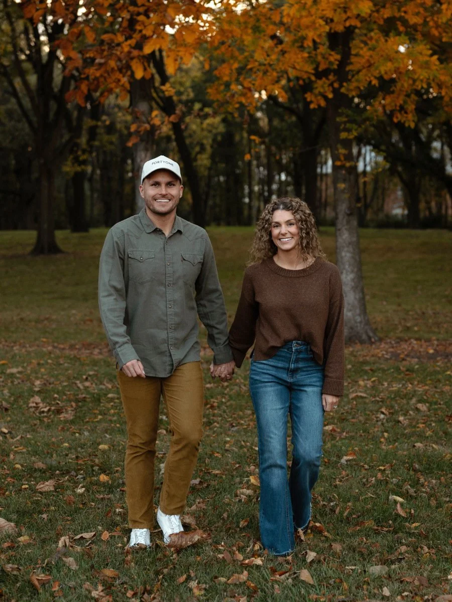 Pastor Joey Brown and his wife, Macy, walk together while holding hands.