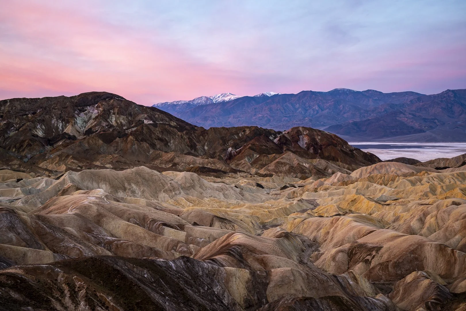 Sunrise at Zabriskie Point - looking toward Telescope Peak you can just see the snowcapped summit in the distance.
