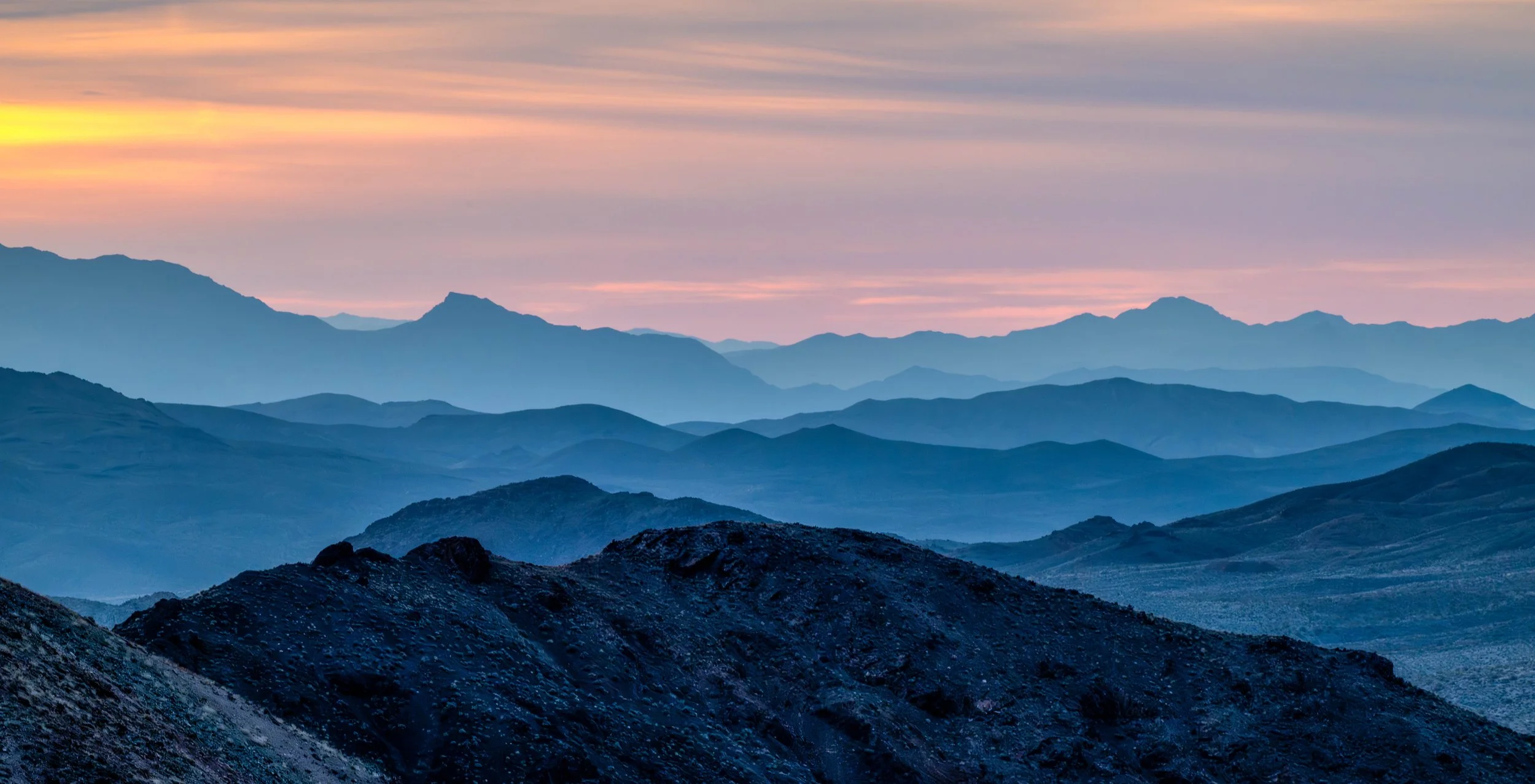 Sunrise at Dante's View - looking east as the sun rose, at 6,000 feet above sea level, the temperature was about 40 degrees Fahrenheit. 