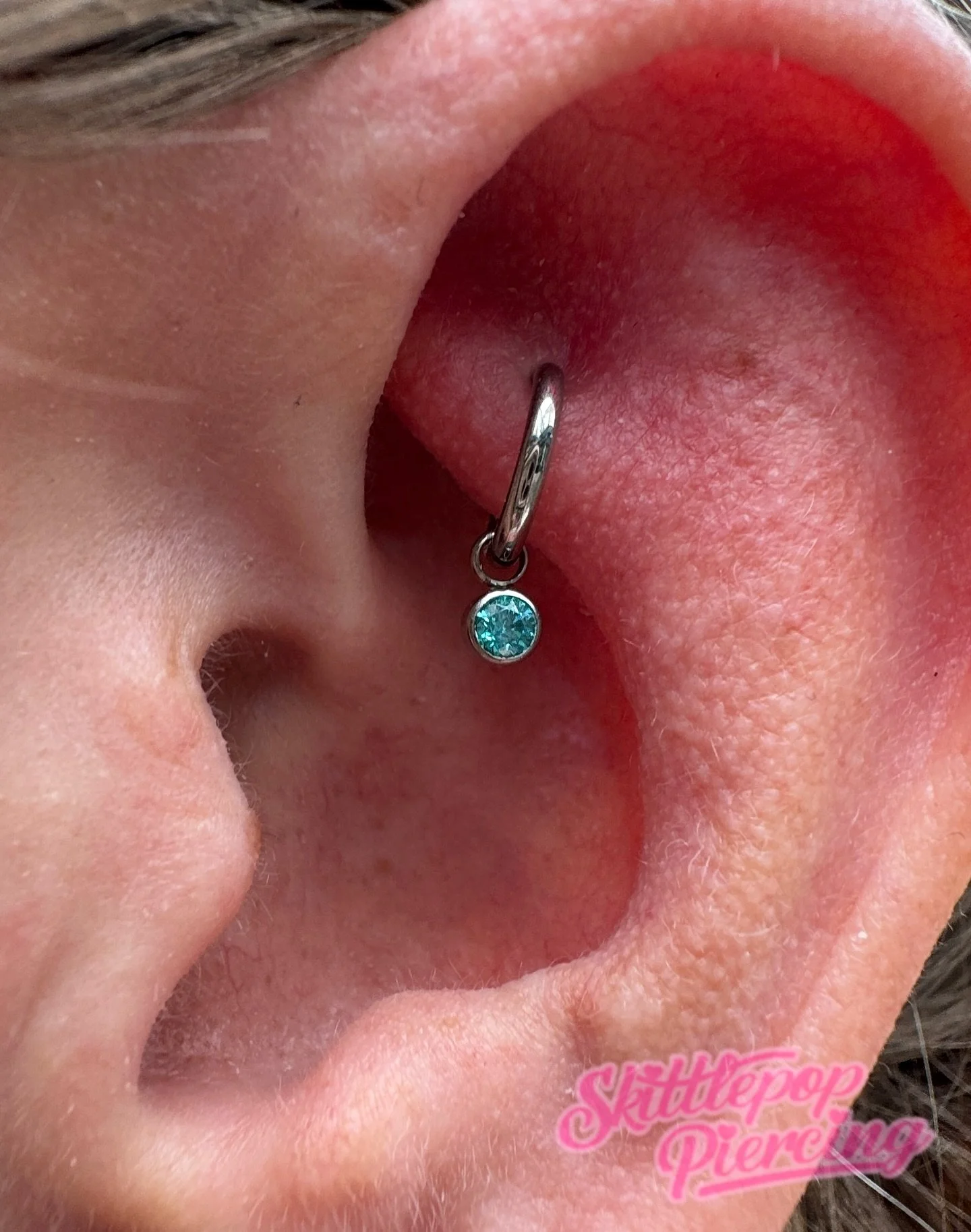 Healed rook piercing. 

One of my favourite things is upgrading healed rooks to rings with little charms. 

Rooks can be a trickier heal averaging around 9-18months so if your planning on a similar look please be super patient, just like this wonderf