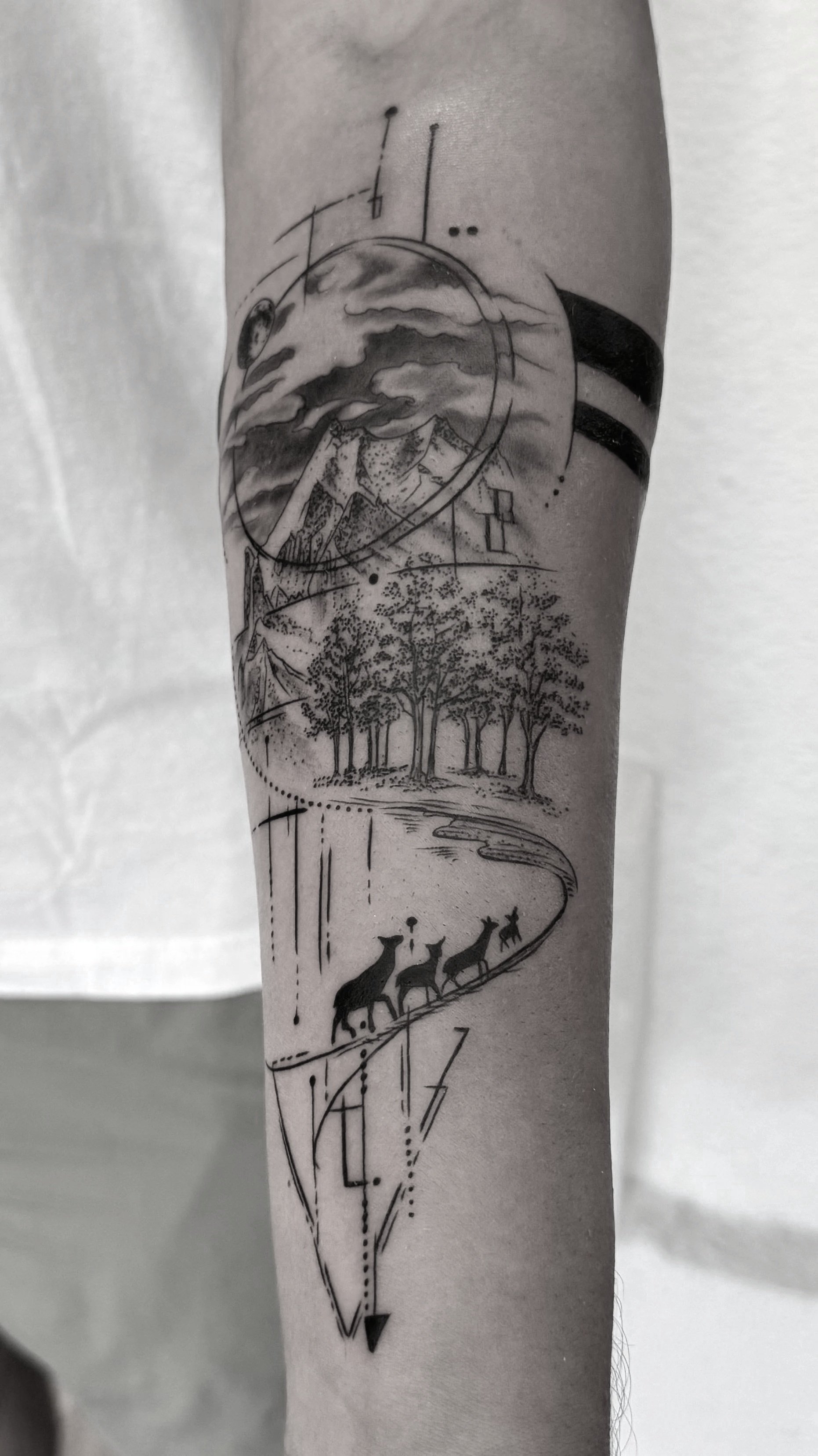 geometric mountain clean outline female tattoo artist near me