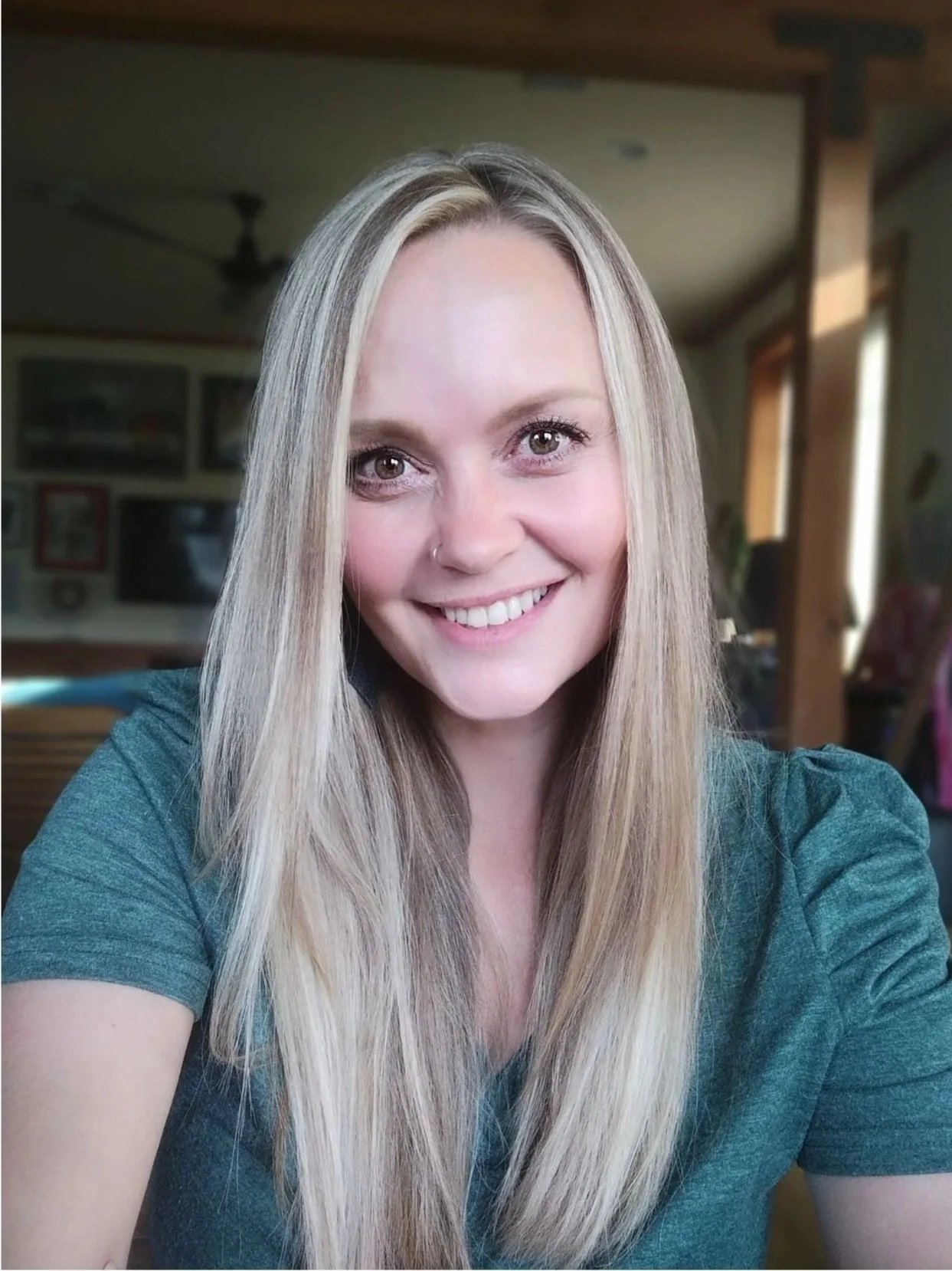 Tricia Pomering - Woman with blonde hair and friendly smile - She hosts cultural retreats to Taiwan with small intentional groups.