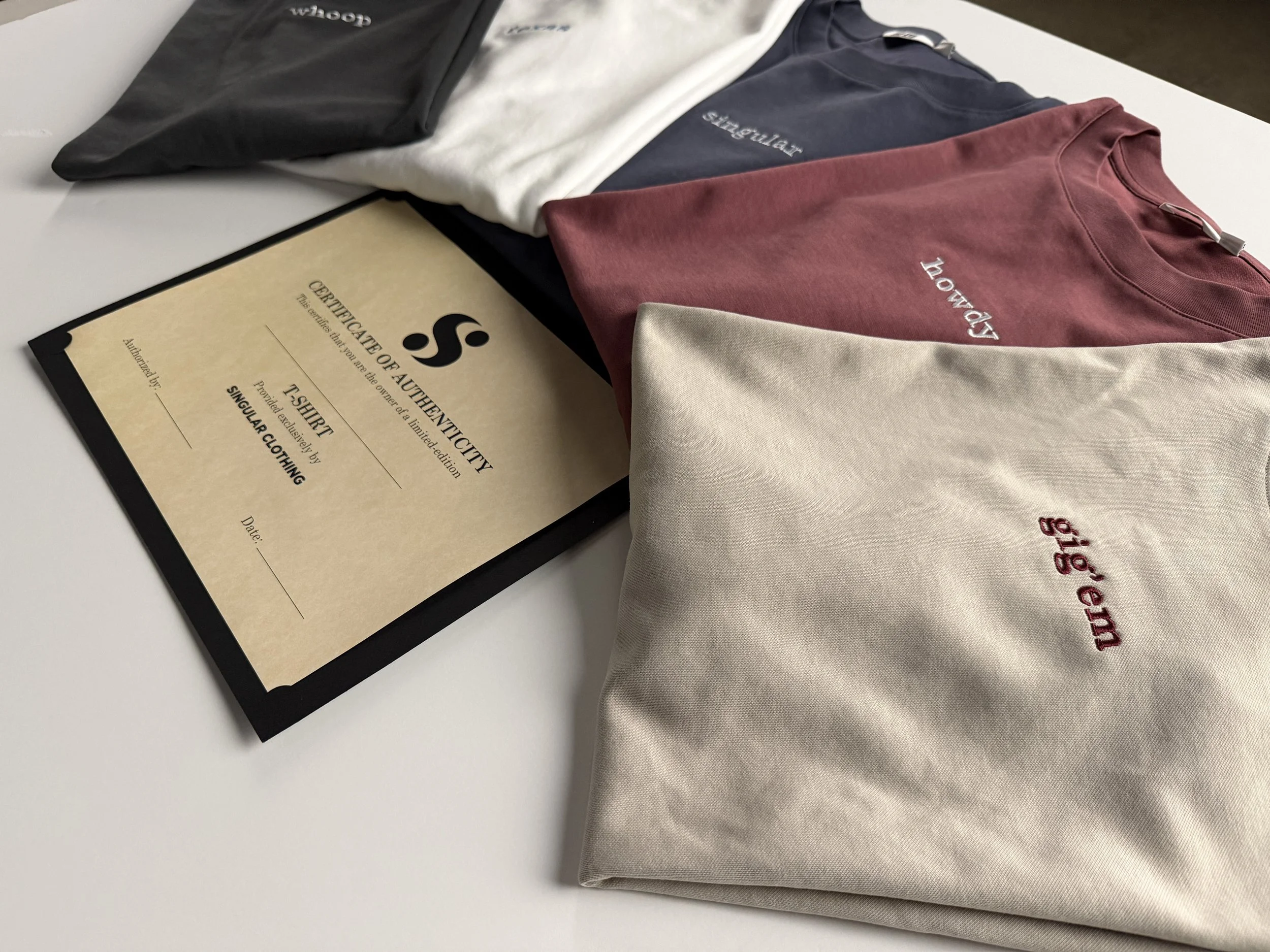 singular | unique embroidered apparel