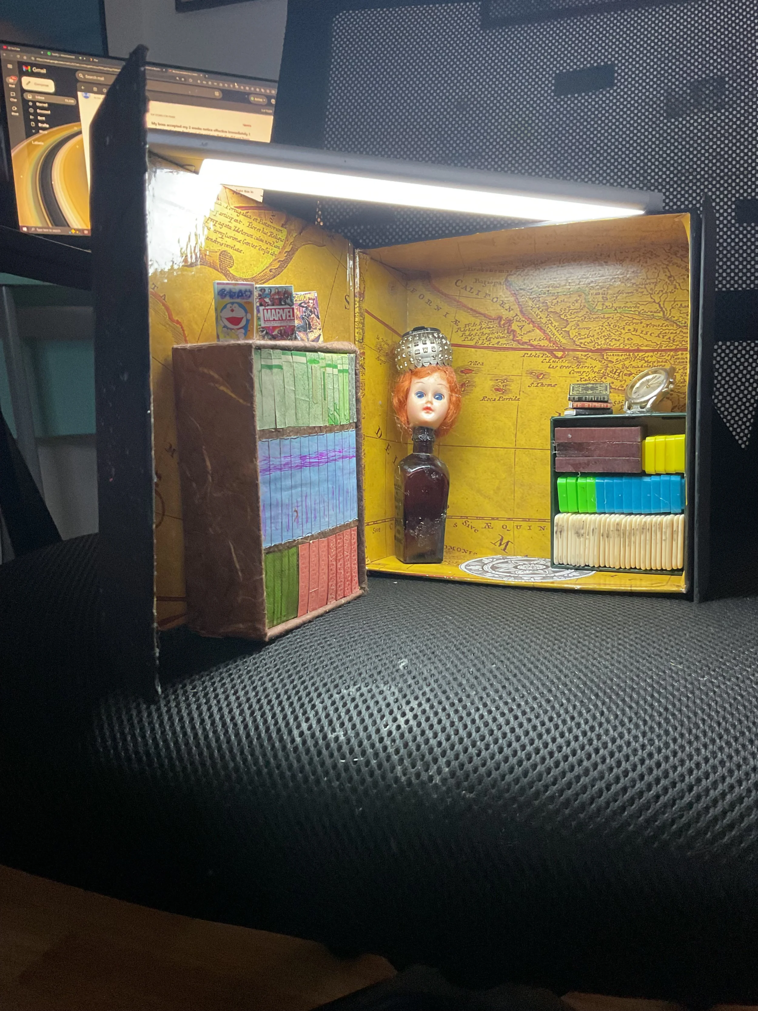 Bookworm & the Starpaper Library
A shrine to lost stories, tiny truths, and the quiet gravity of paper.
Assemblage Diorama – 1930s–2020s Mixed Media Installation
Dimensions (Closed): 8″ × 8″ × 3″ Dimensions (Open): 17″ × 8″ × 3″
Created August 2025