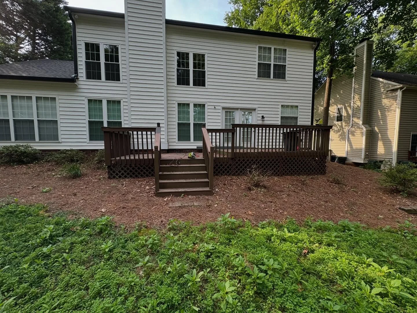Full deck tear down! We rebuilt using a cantilever frame, framed box lattice underneath, and Trex composite deck board finish! Swipe to see the process