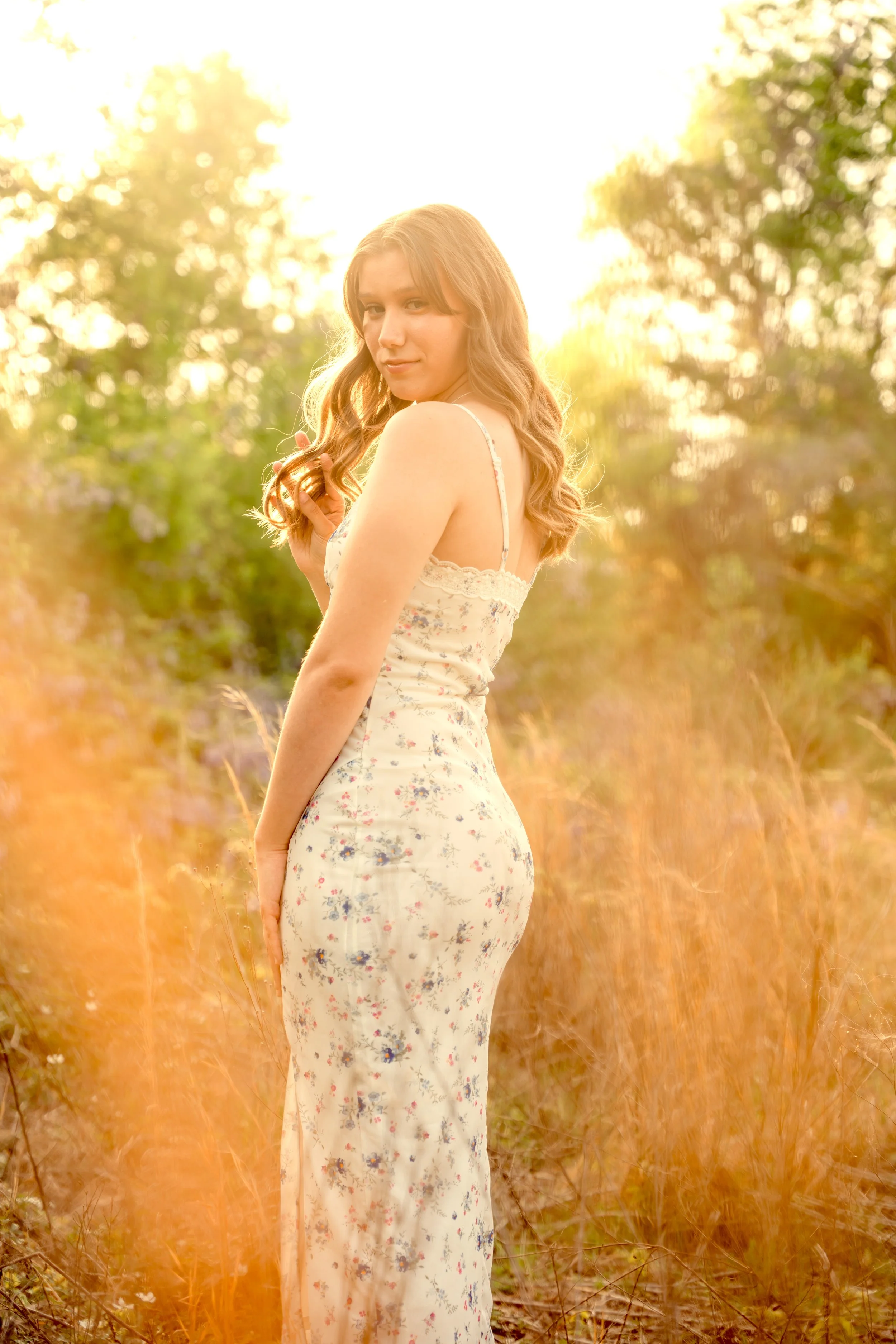10-seniorphotography-silverlightvisions-photoandfilm-spring-floral-longveiwtx-tall-grass-wildflower.jpg
