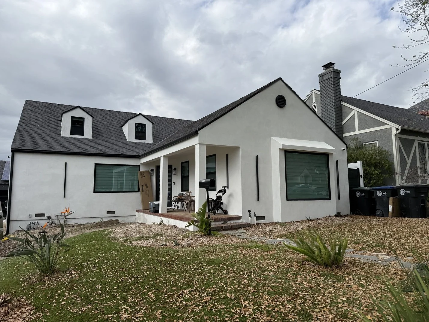 Exterior Remodel with new windows, front door and stucco