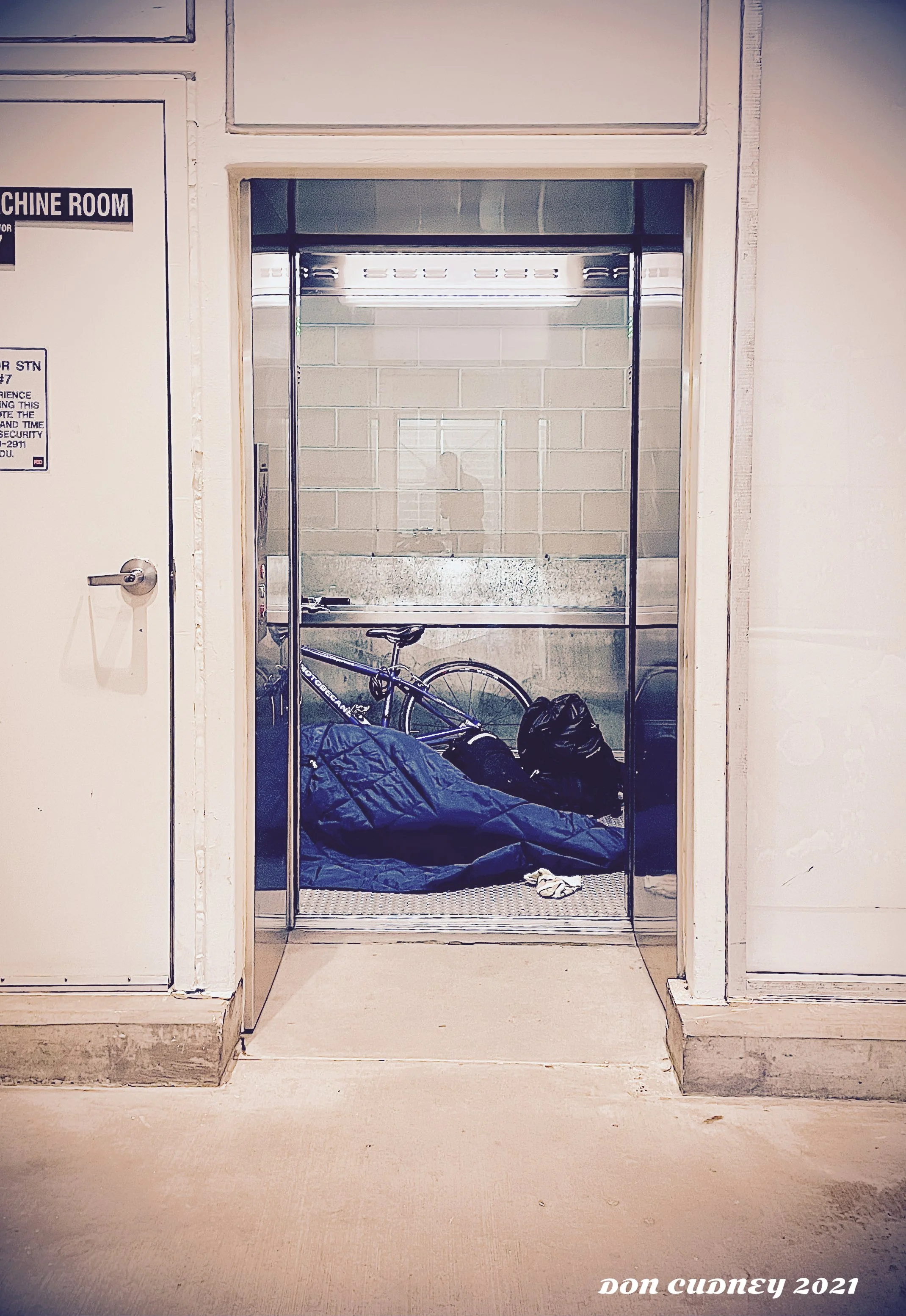 homelessinelevator.JPG