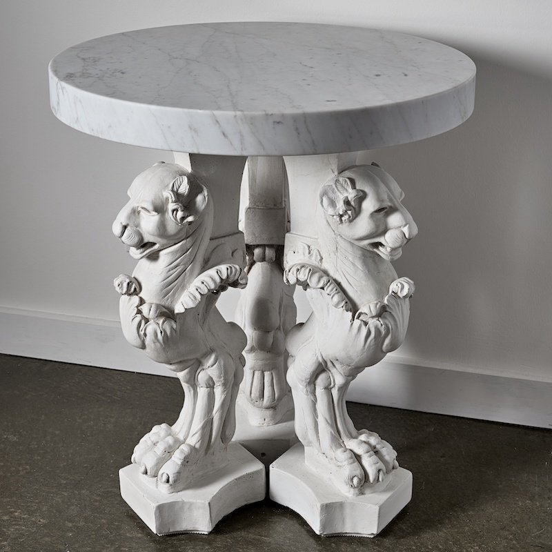 GIFFON. 3 legged concrete table with marble top.  Diameter: 65