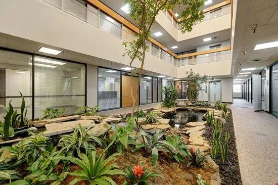 Atrium lobby of the building where the Maple Life Solutions office is located in Warr Acres, Oklahoma