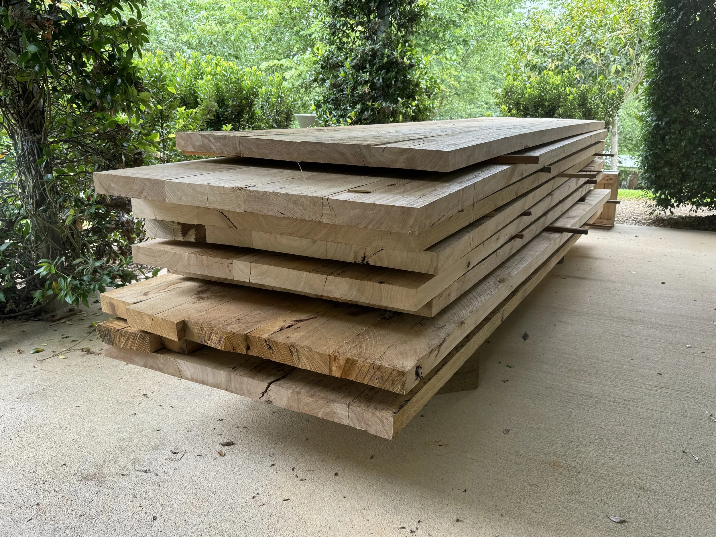 Hardwood panels ready to create an outdoor bookcase and furniture.