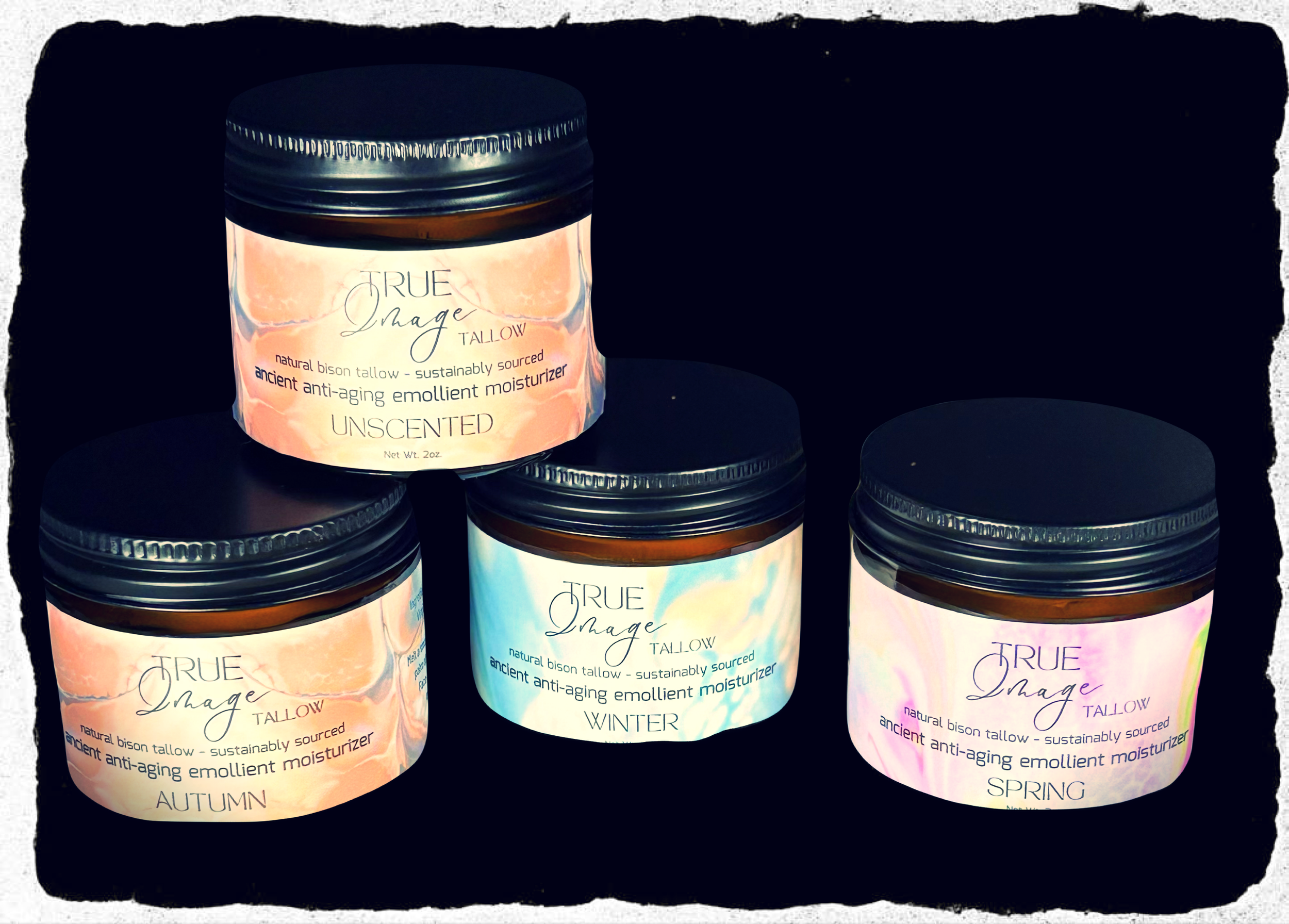 Four jars of True Image Tallow moisturizer in different scents, labeled Unscented, Autumn, Winter, and Spring. The jars are brown with black lids and feature a white label.