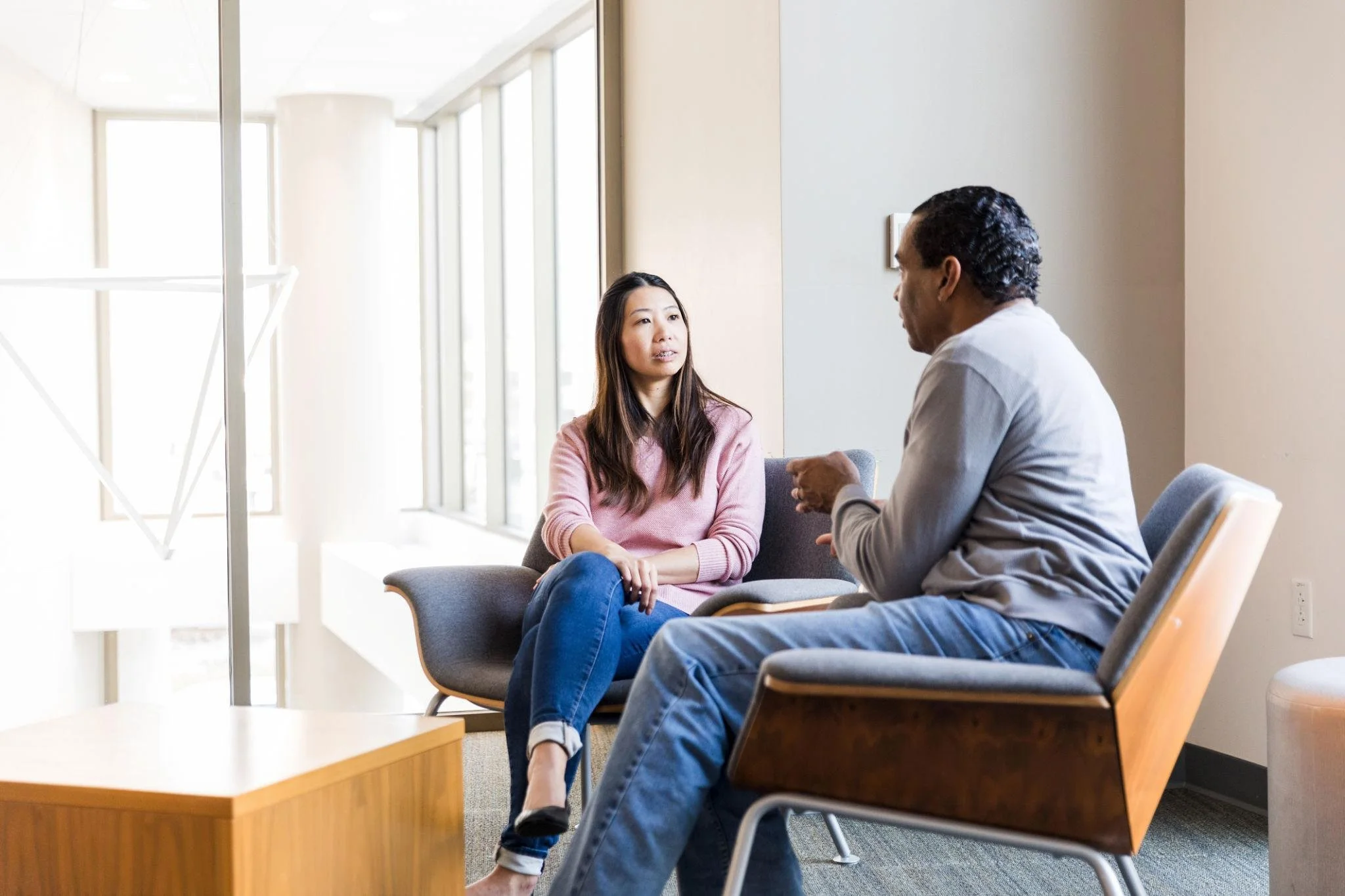 Calm conversation emphasizing early support rather than waiting for problems to worsen
