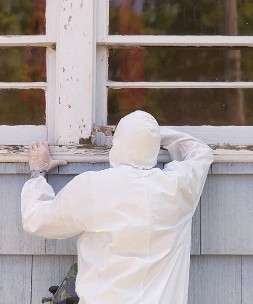 Lead paint removal and stabilization on a pre-1990s home following WorkSafeBC safety standards.