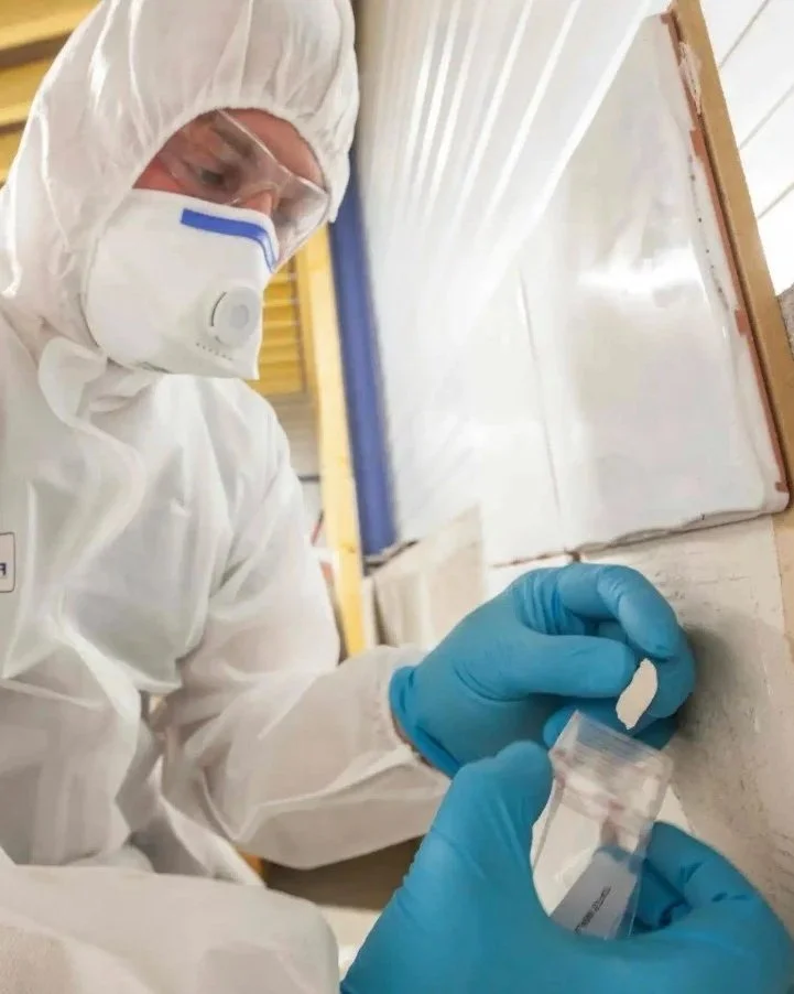 Professional asbestos hazard assessment and material sampling by Environmentalist for a Kelowna property.