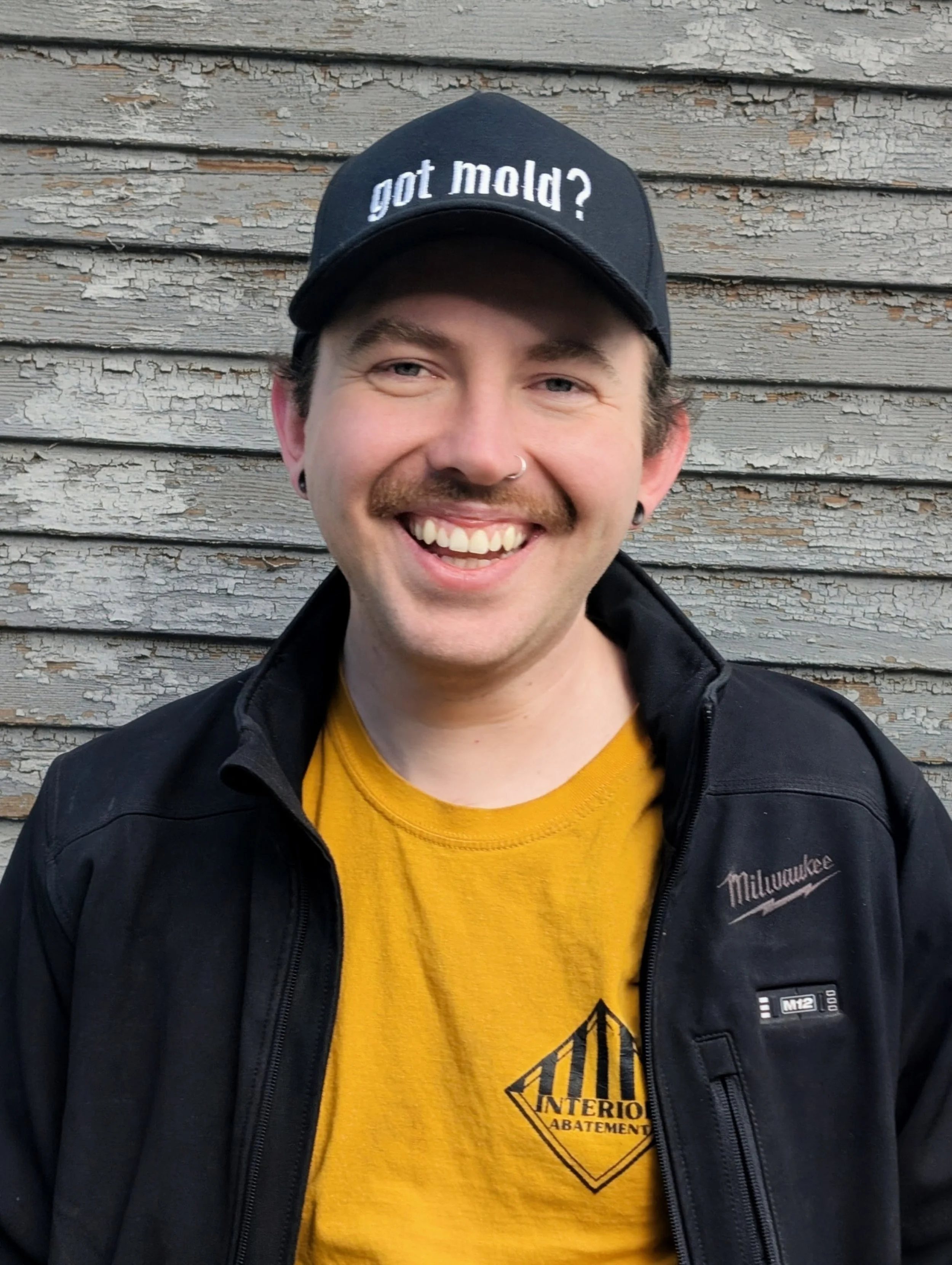 Owner of Interior Abatement in professional work uniform, providing haz-mat and remediation services to homeowners in the Okanagan Valley.