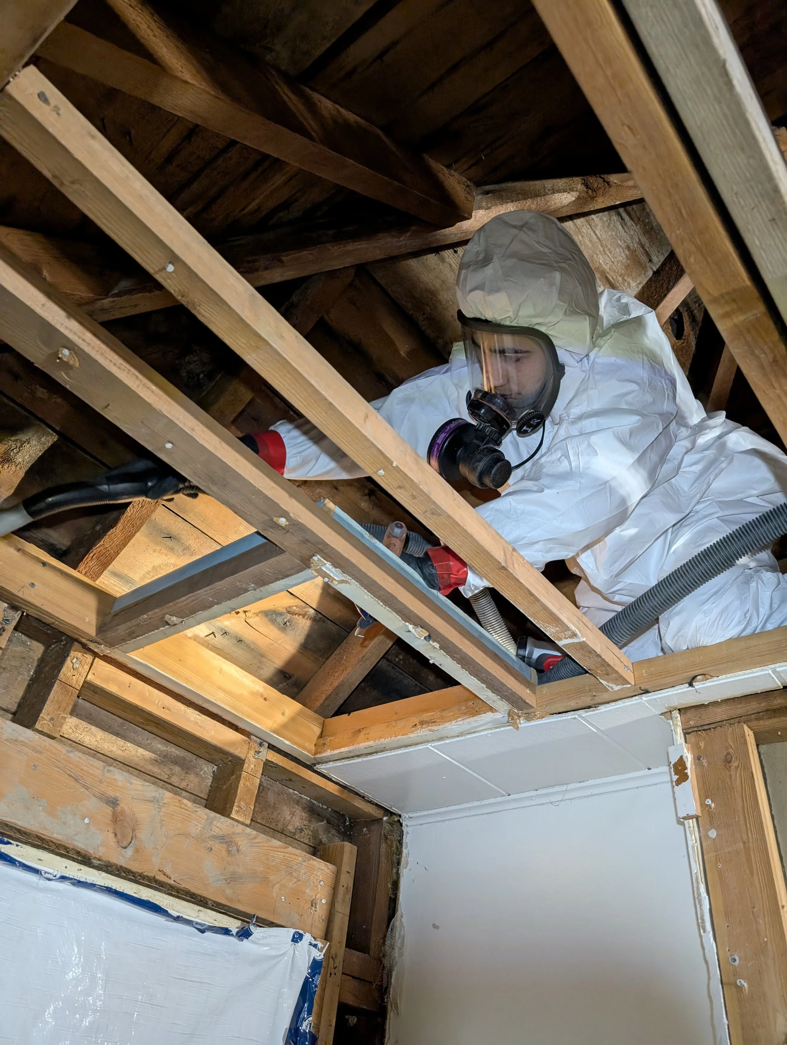 Interior Abatement providing asbestos clearance for a home demolition project in Kelowna BC.
