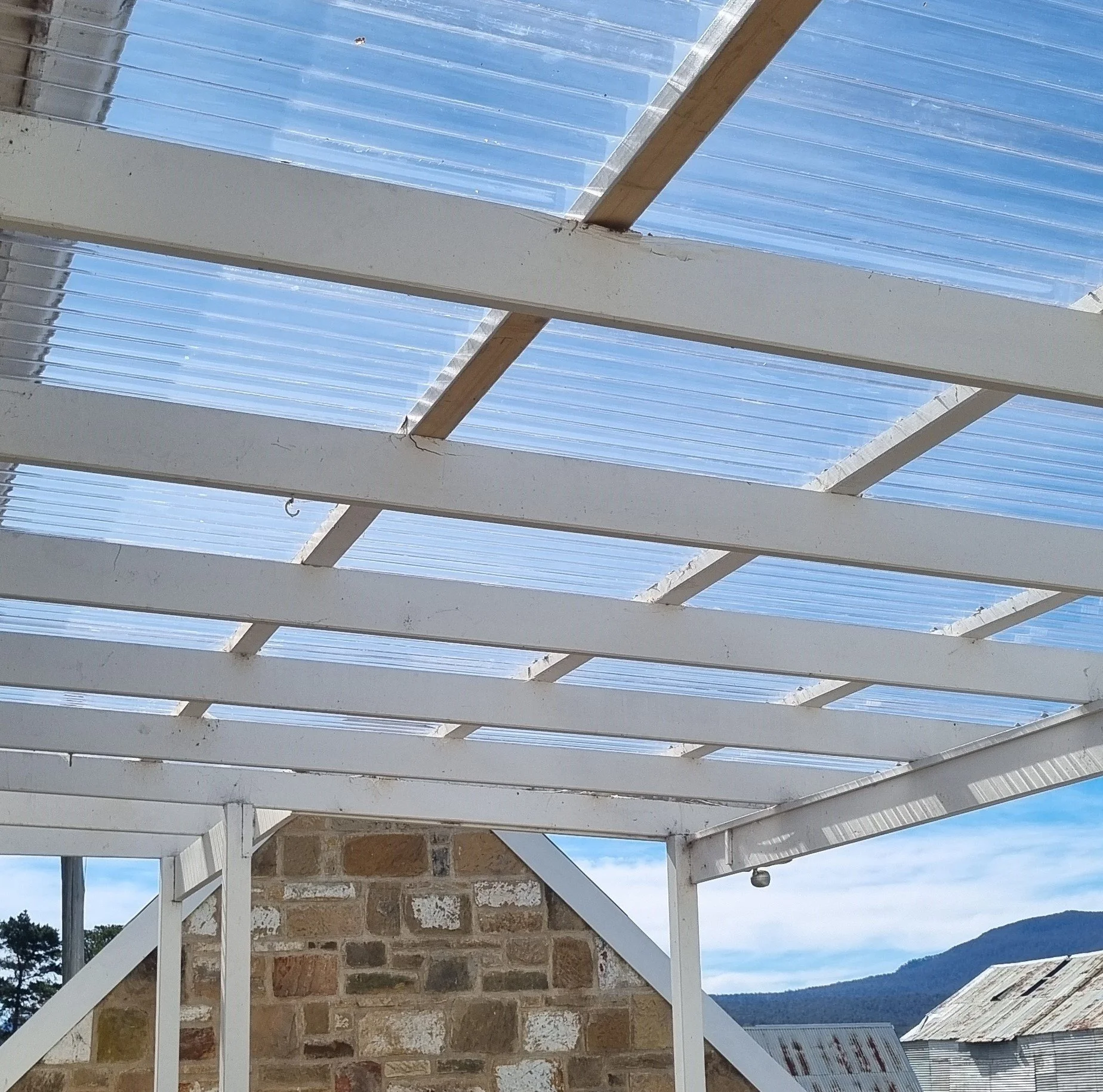 Crisp Designs Project Eight Deck Laser Light Roof Replacement.jpg