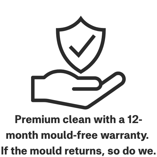 Outline of a hand holding a shield with a checkmark, symbolizing protection, along with text about a 12-month mold-free warranty.