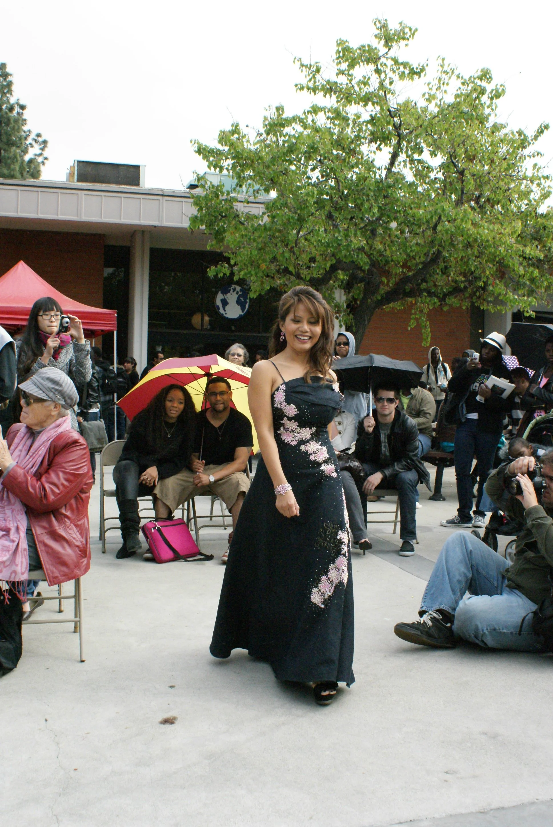 Oui in her custom, hand-beaded dress for fashion-show presentation - 2010