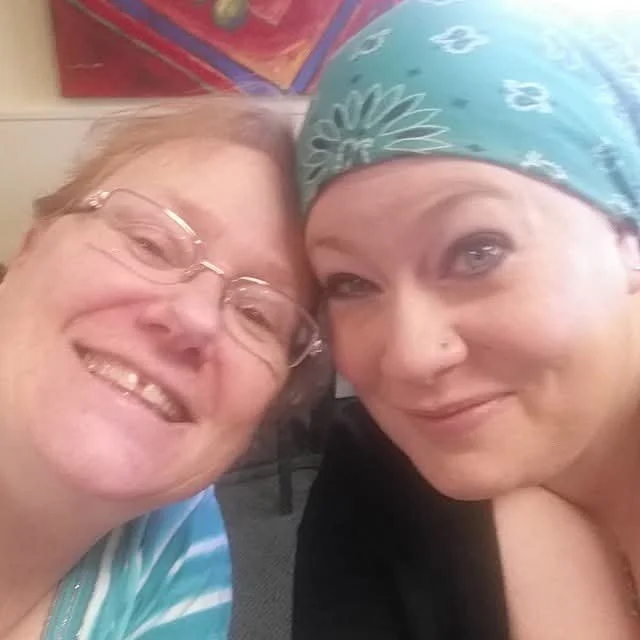 Two smiling red-heads crafty Alaskan mother and daughter makers.
