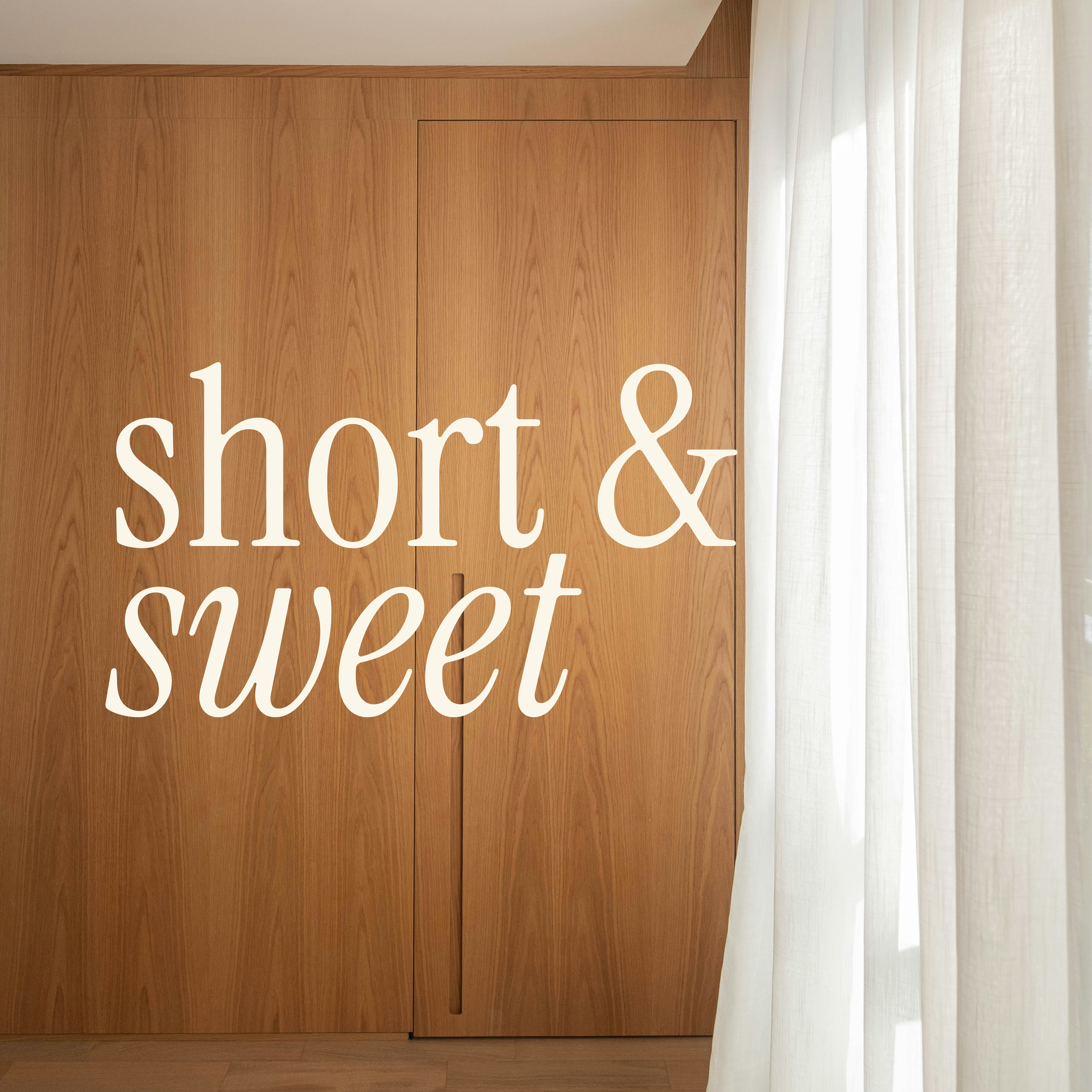 Close-up of a wooden cabinet next to a light-colored curtain, virtual styling session with Phoebe.