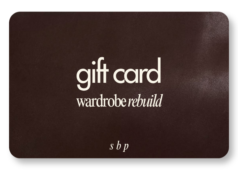 A gift card with a dark background and white text that reads 'gift card wardrobe rebuild sbp'.