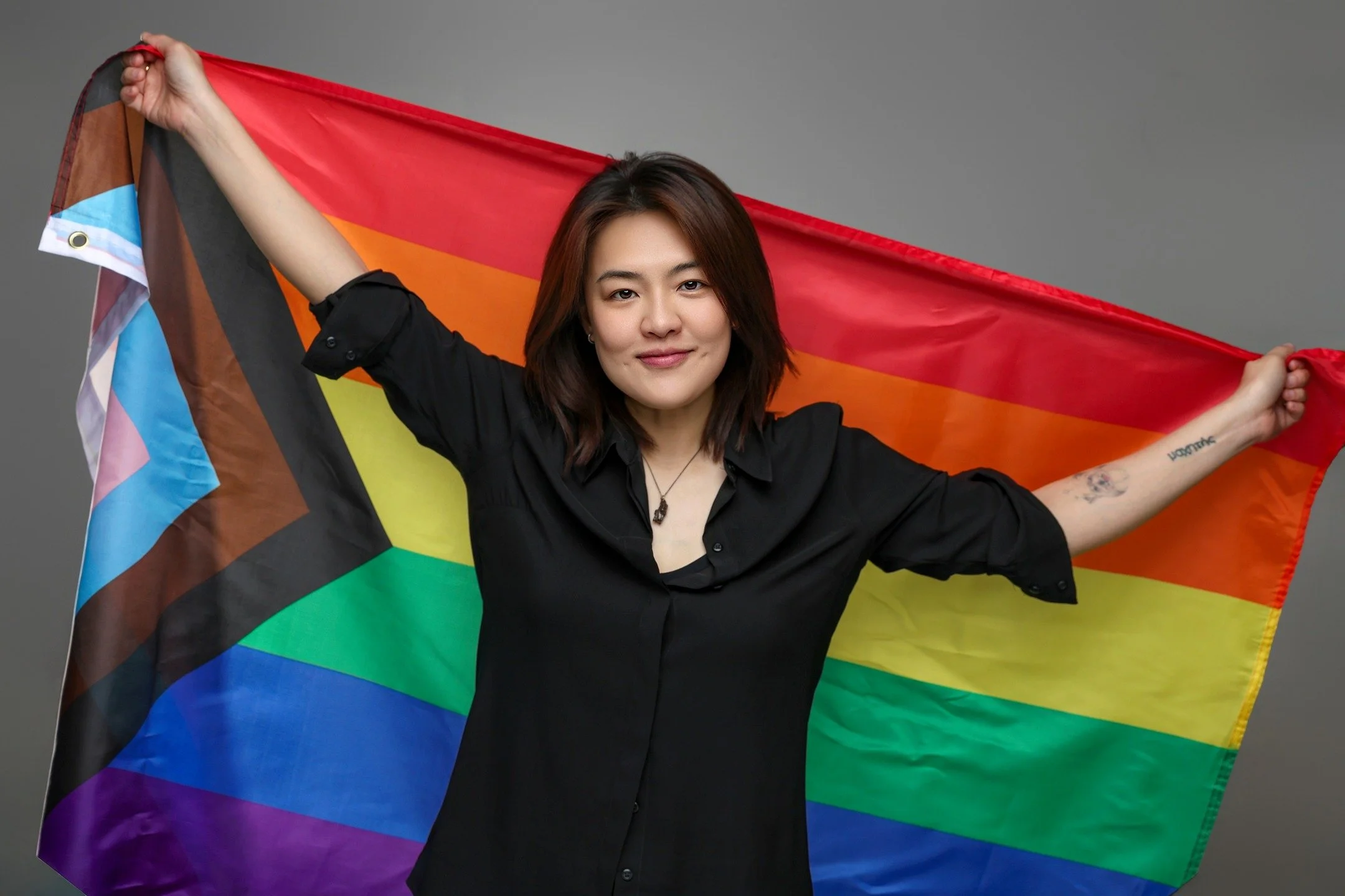 I've been wanting to do this for a long time. A self portrait. Holding the rainbow flag. Fully myself.

But self portraits are hard. You set everything up alone, adjust alone, run back and forth alone. Not to mention hyping yourself up... It's time c