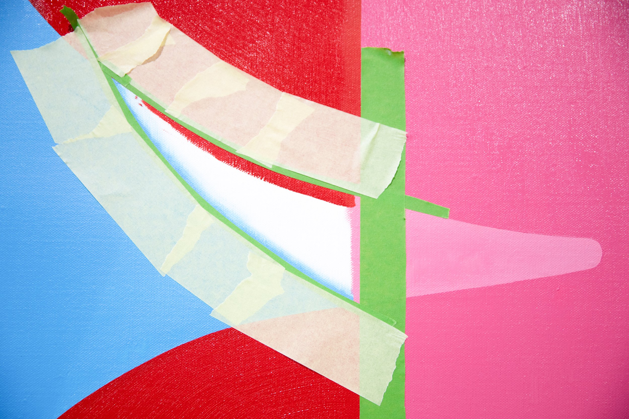 Colorful abstract background with overlapping textured paper in red, pink, blue, green, and white with torn edges.