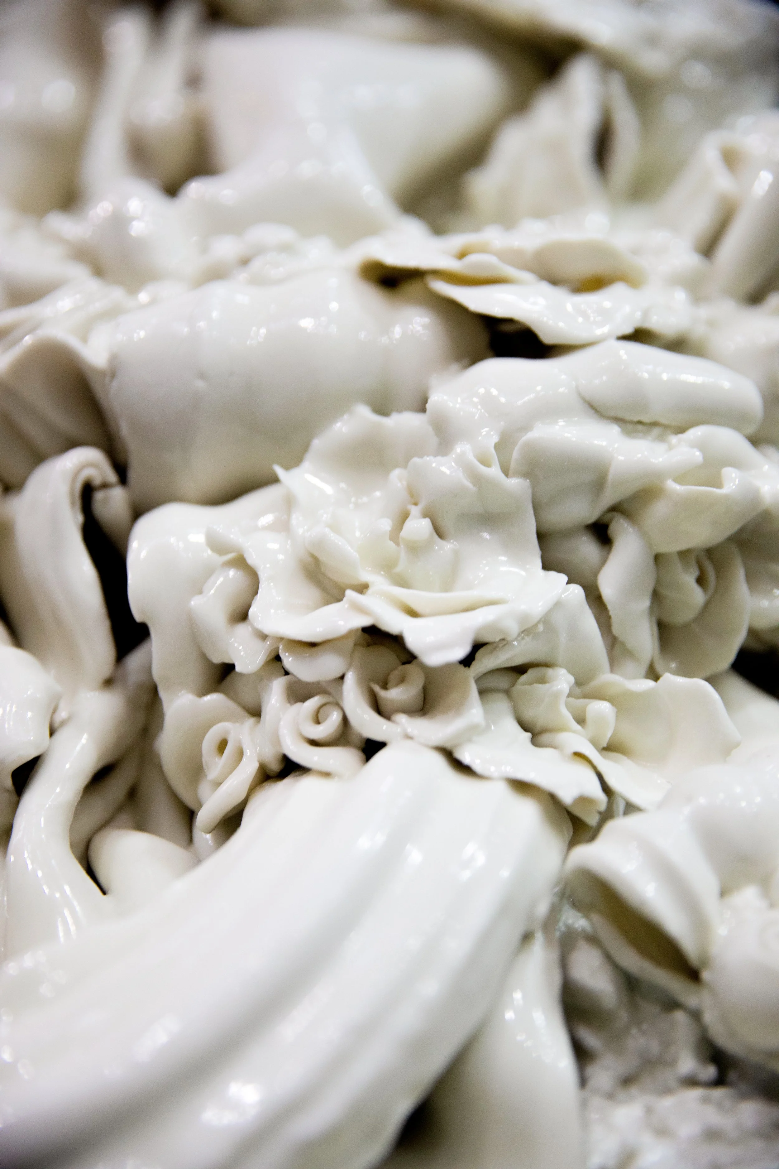 Close-up image of white shredded cheese.