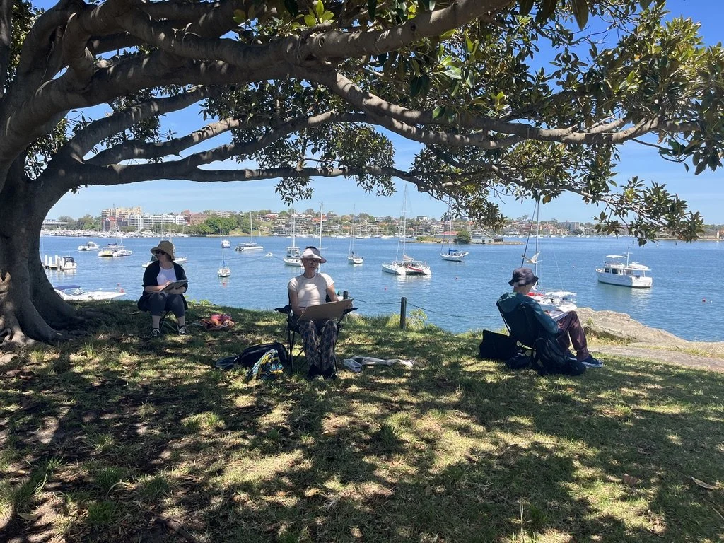 Students painting outside in Birchgrove Elkington park