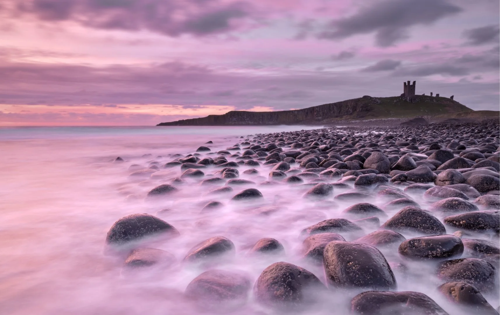 Sunrise on Dunstonburgh - 2nd RUNNER UP - Sue Evans ARPS