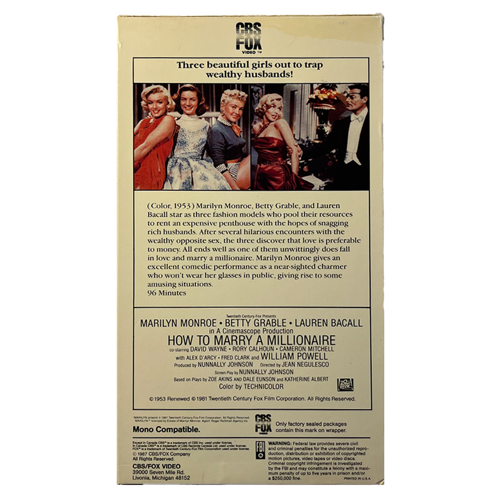 VHS_0020_How-To-Marry-A--Millionaire-Marilyn-Back.HEIC.png