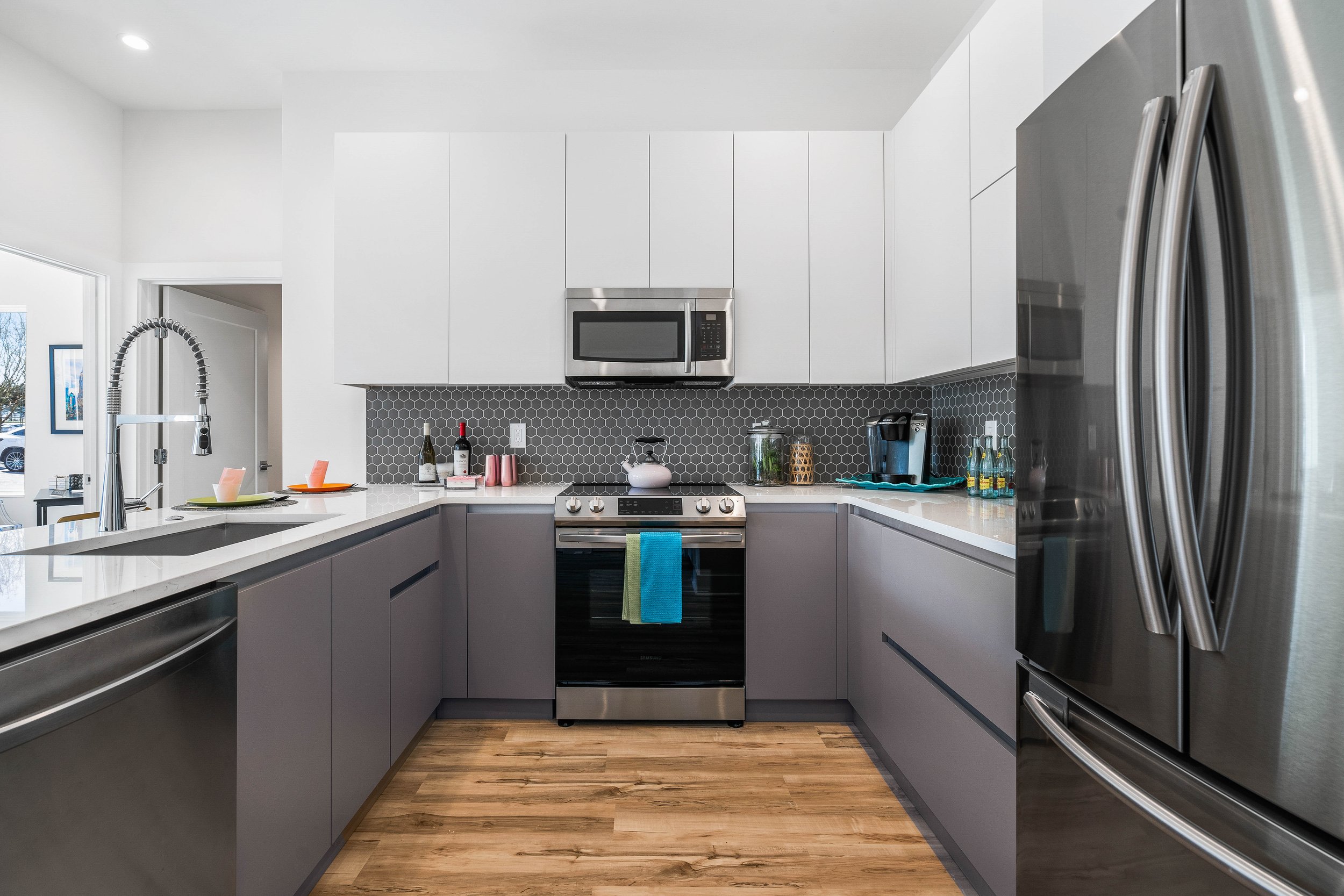 upgraded kitchen with stainless appliances and large island Atlanta condo