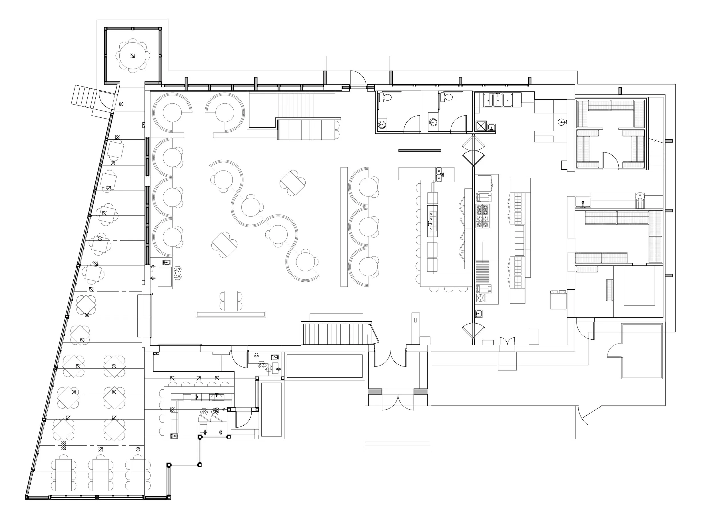 Architectural floor plan of a building, showing various rooms, furniture, and layout details.