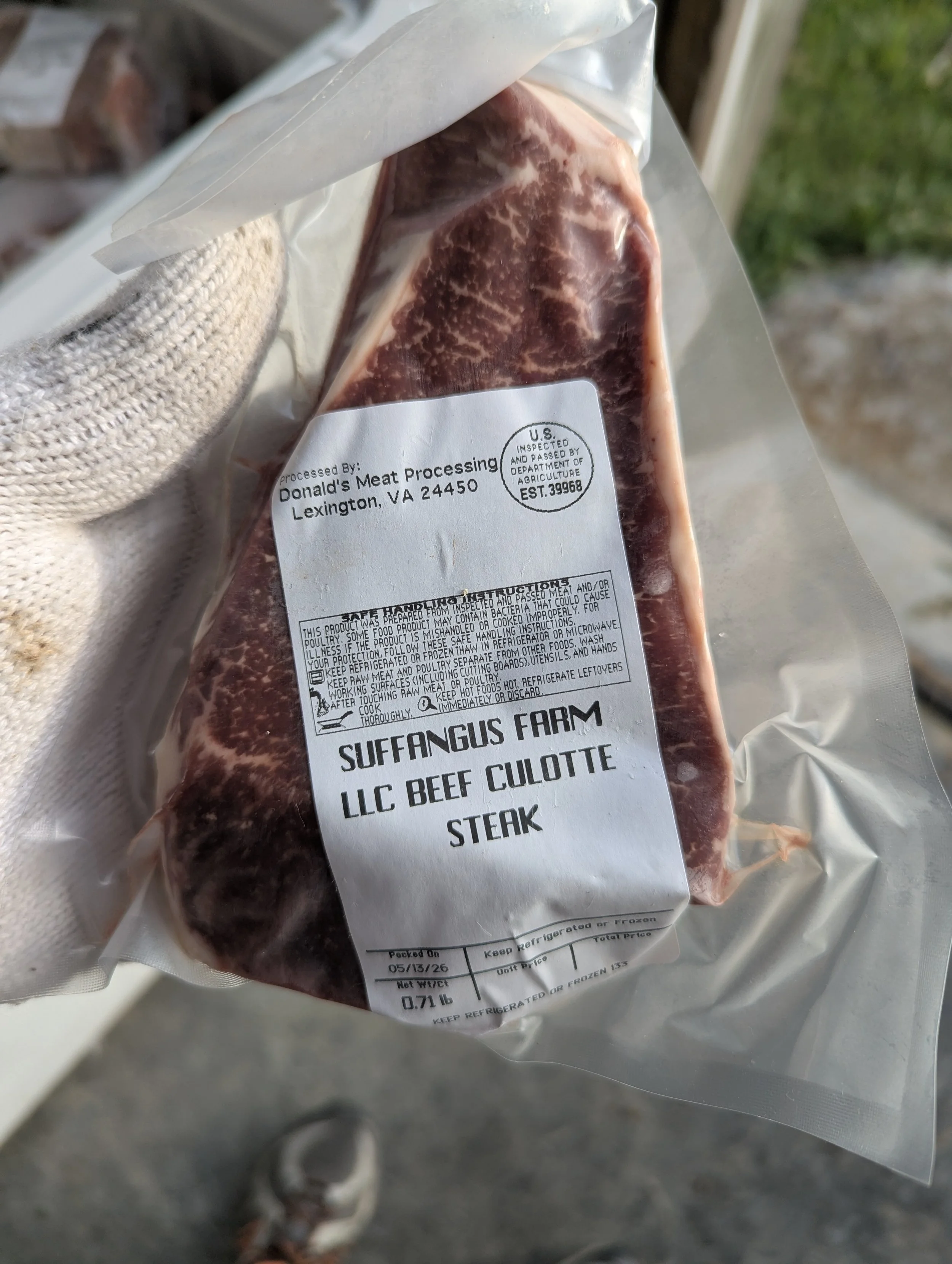 Vacuum-sealed raw beef steak with a label from Donald's Meat Processing in Lexington, VA.