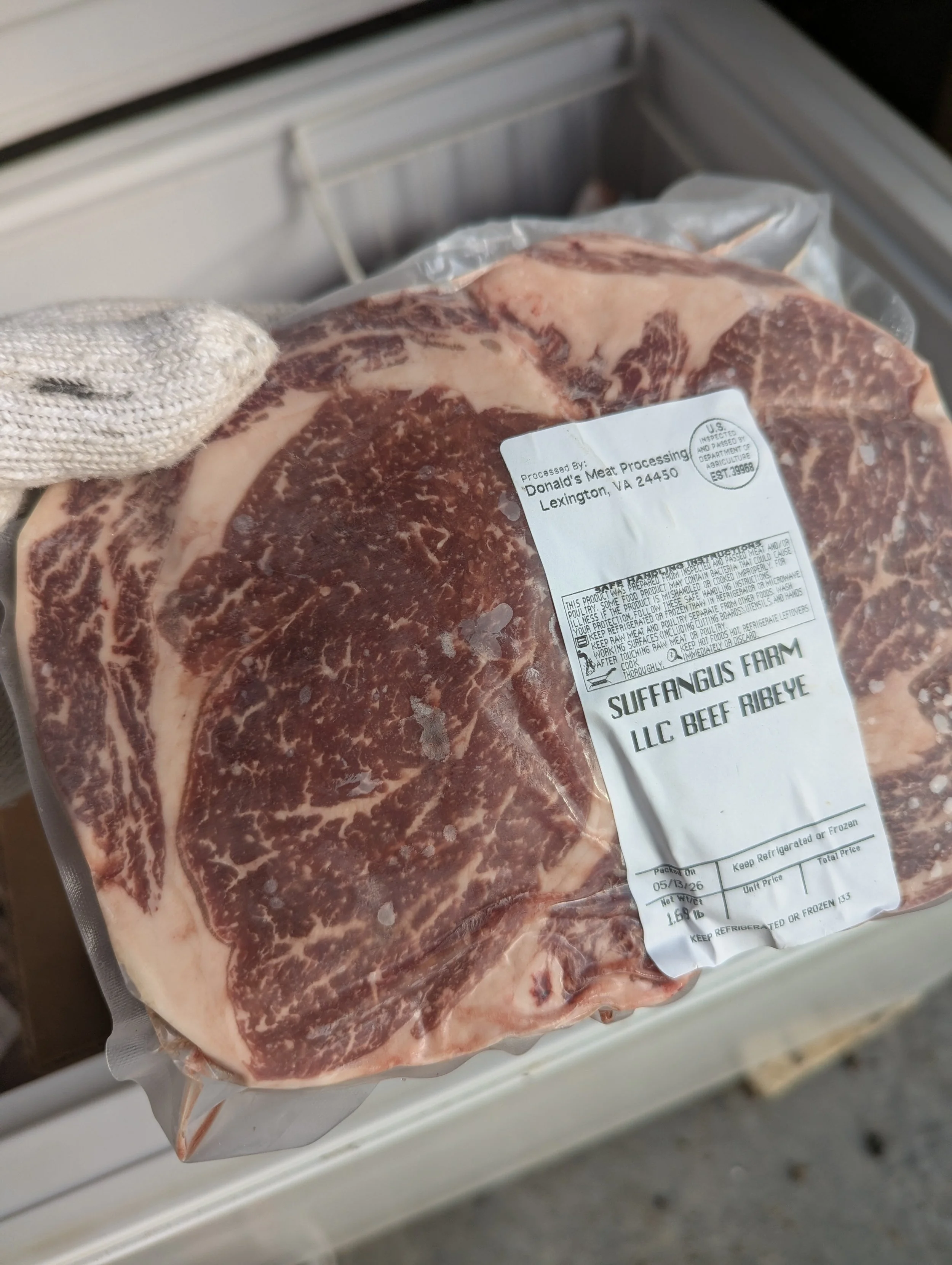 A sealed package of USDA inspected suckling beef ribeye from Siffangus Farm.