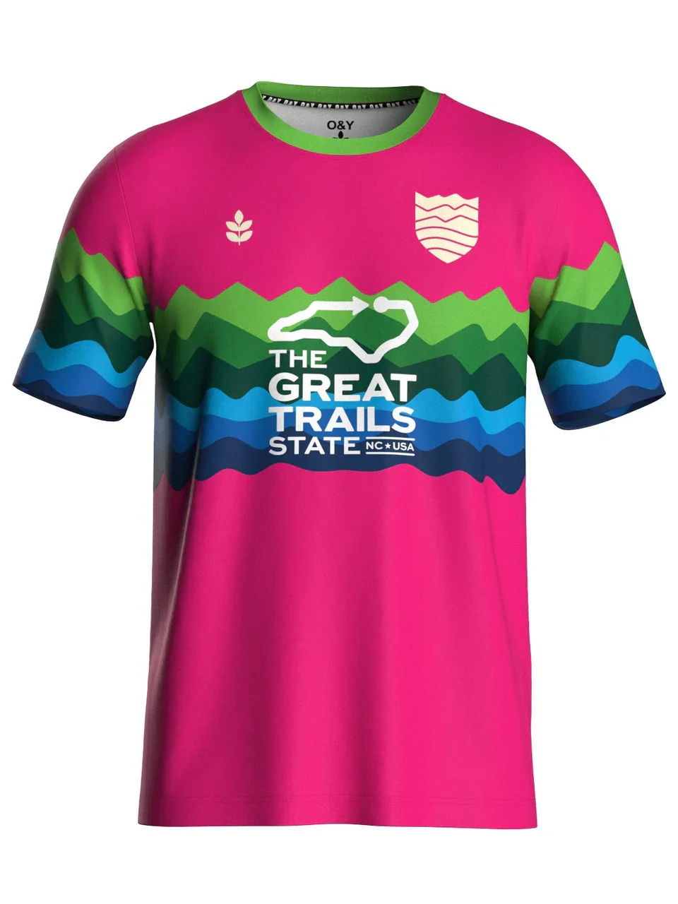 Colorful trail running shirt with pink, green, and blue mountain pattern, featuring the logo and text for 'The Great Trails State' in North Carolina, USA.