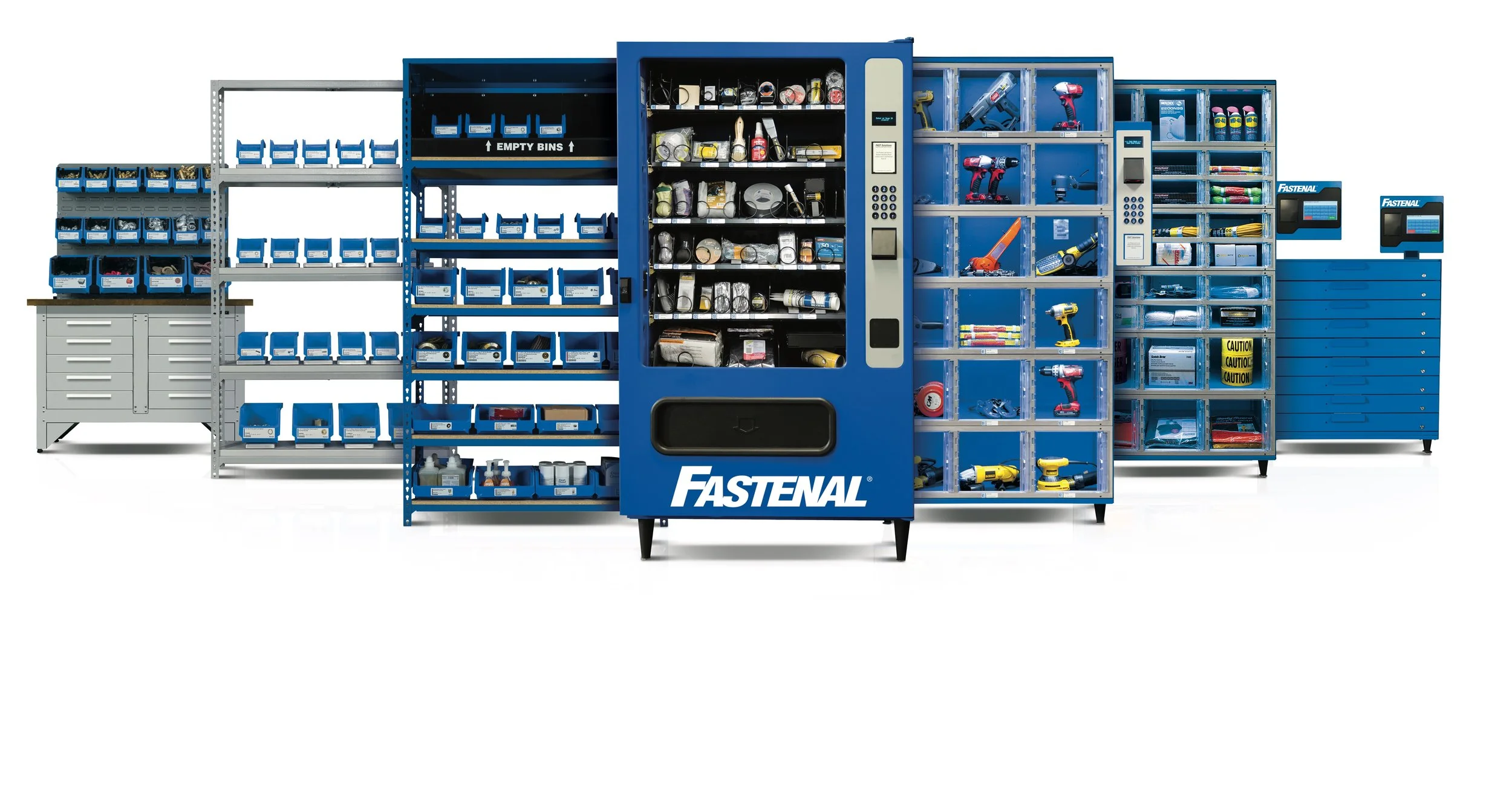 A collection of organized retail shelves and storage cabinets holding tools, hardware, and supplies, with a central vending machine branded 'Fastenal'.