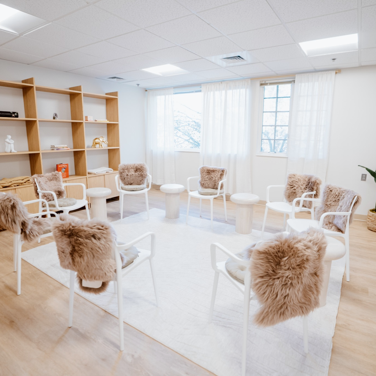 A bright, calm room at SOLEO with soft chairs