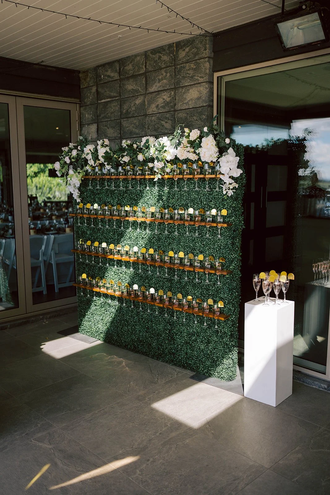 A beautifully crafted signature cocktail at a wedding bar, showcasing unique flavors and garnishes.