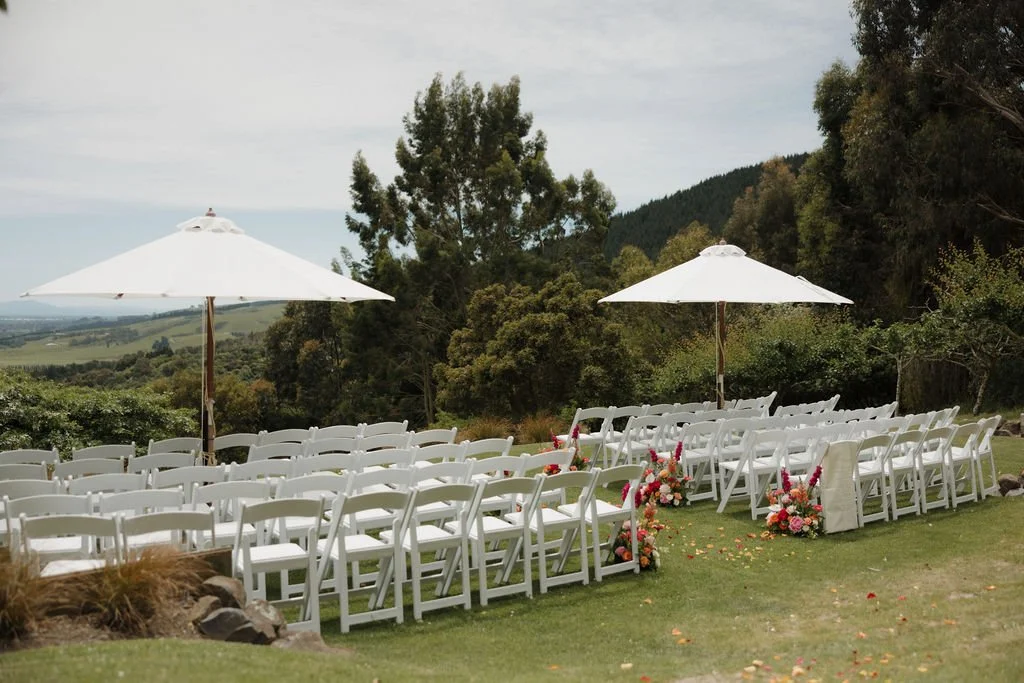 Elegant outdoor wedding ceremony at Waipuna Estate surrounded by Canterbury countryside.