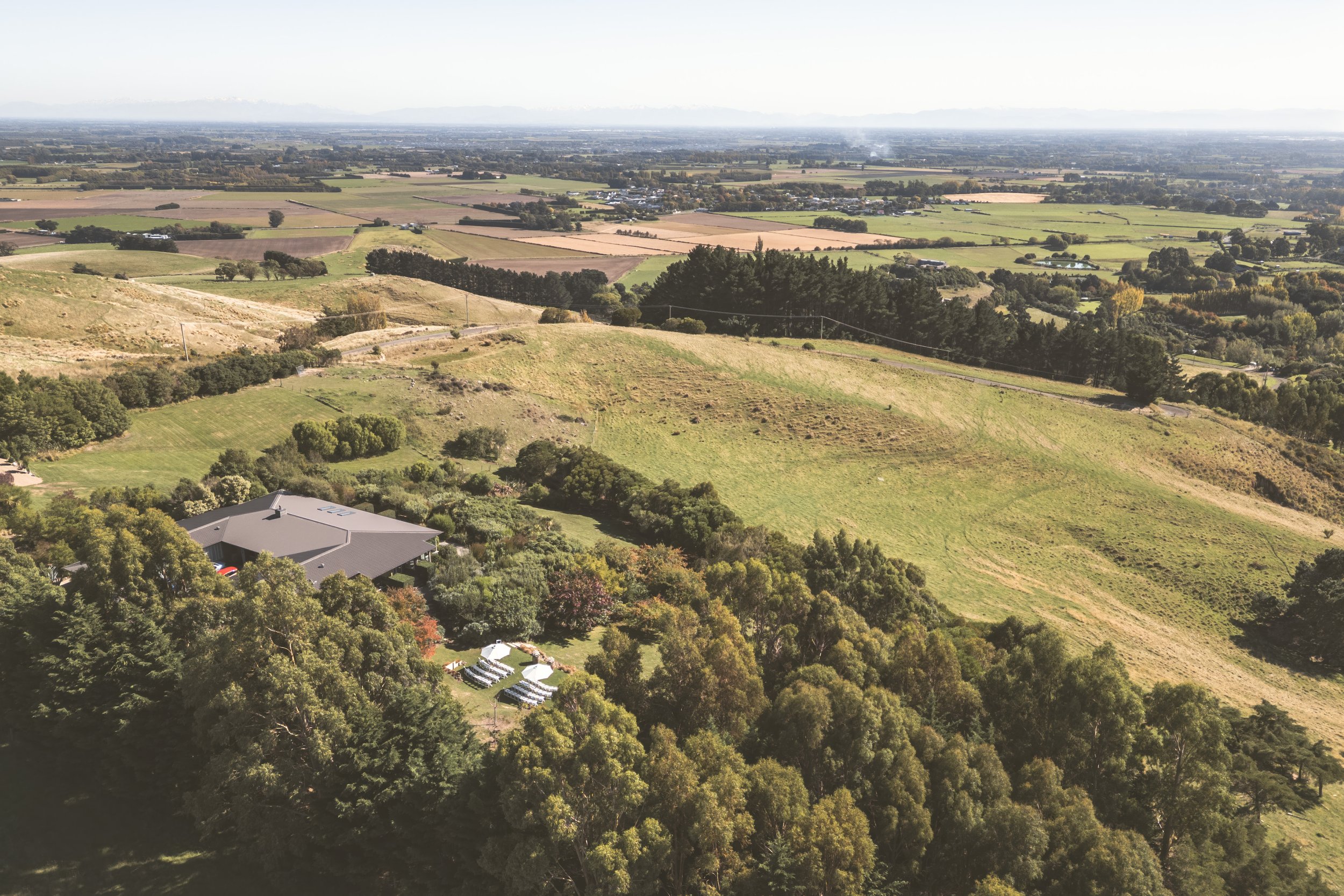 Waipuna Estate wedding venue surrounded by gardens and scenic countryside