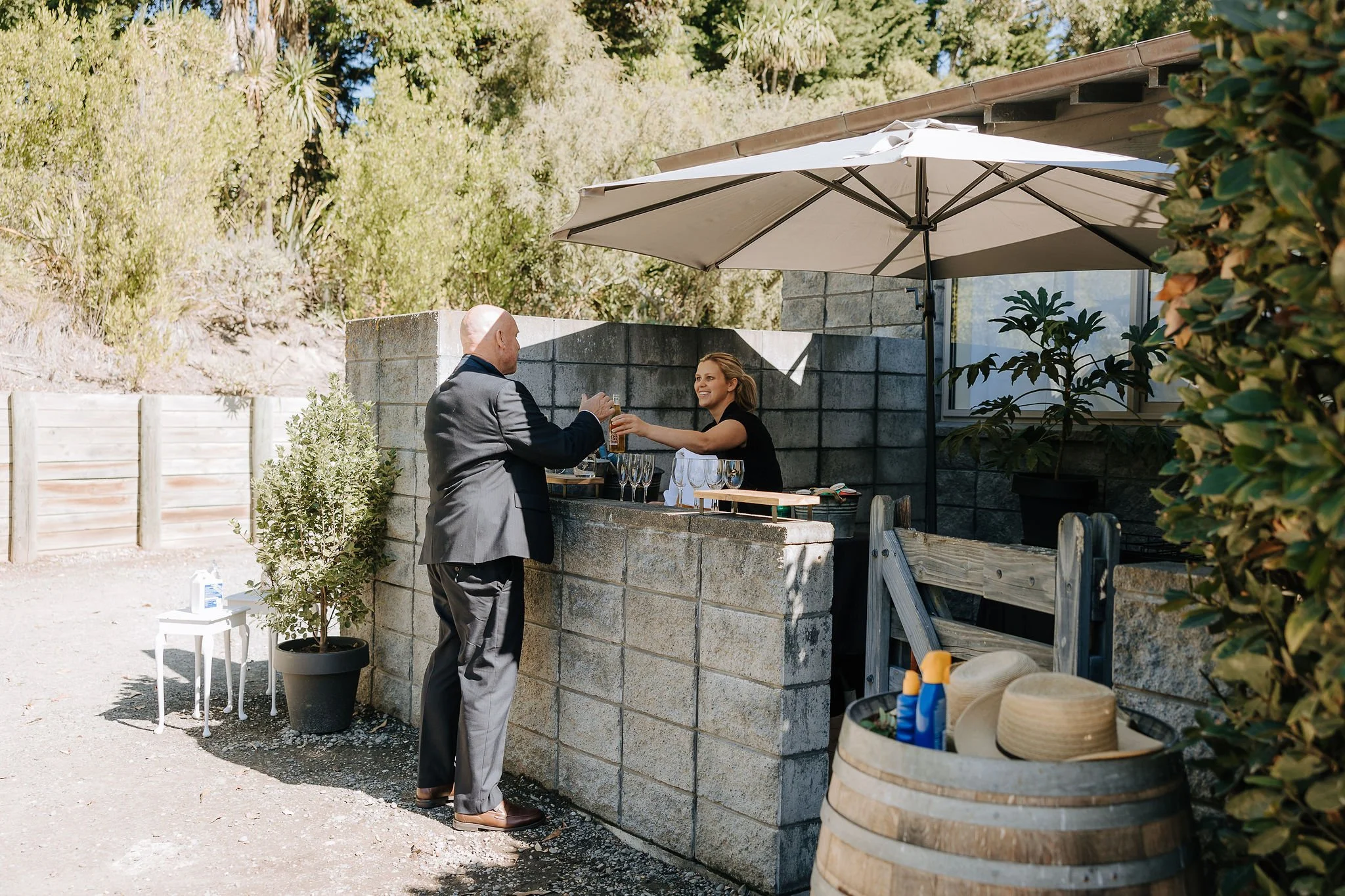 A selection of craft beers at a wedding station, featuring local New Zealand brews for guests to enjoy.