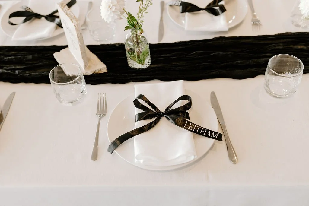 simple and elegant wedding table styling with minimal decor and soft floral details
