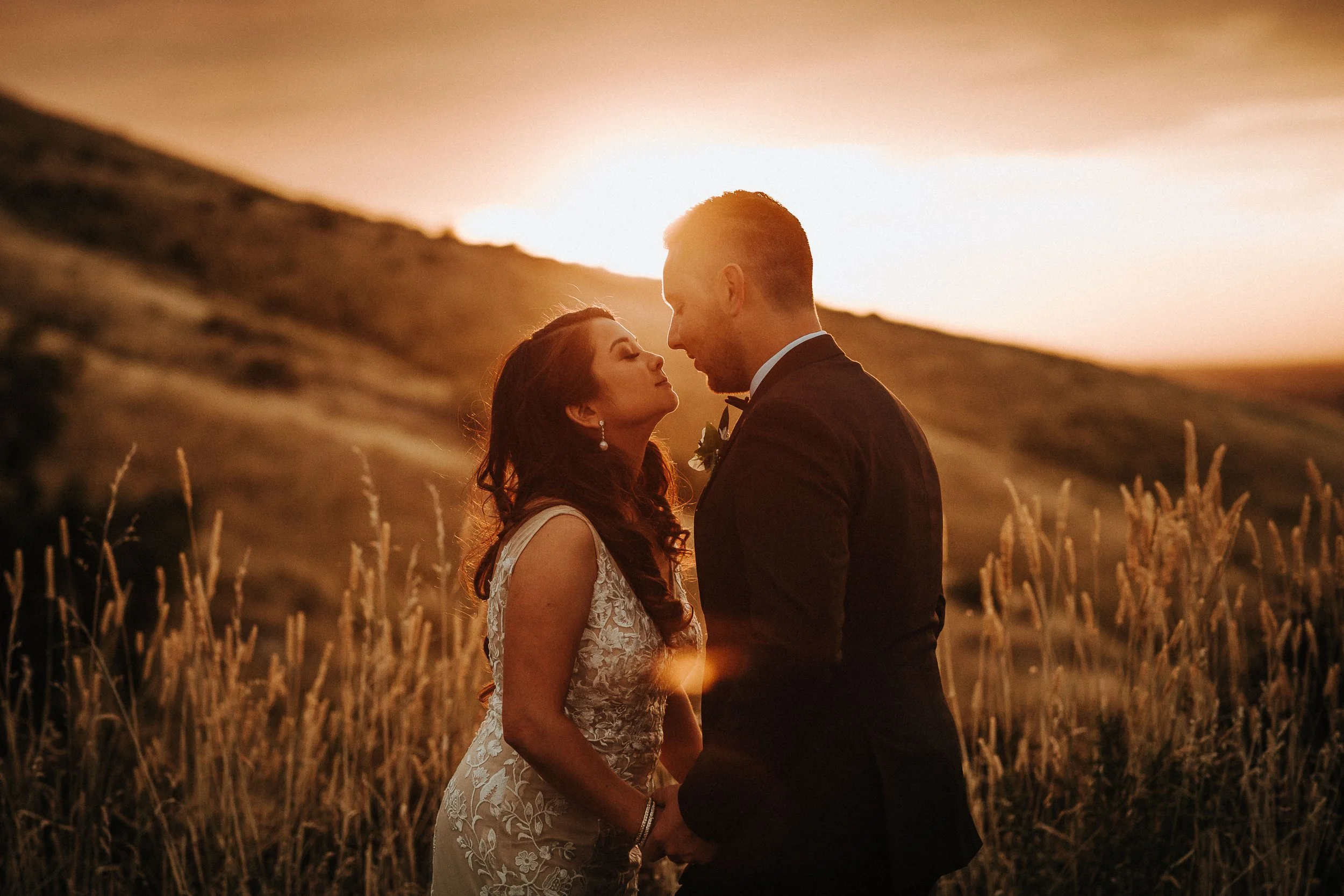 Sunset wedding at Waipuna Estate with the Southern Alps and Canterbury Plains in the background