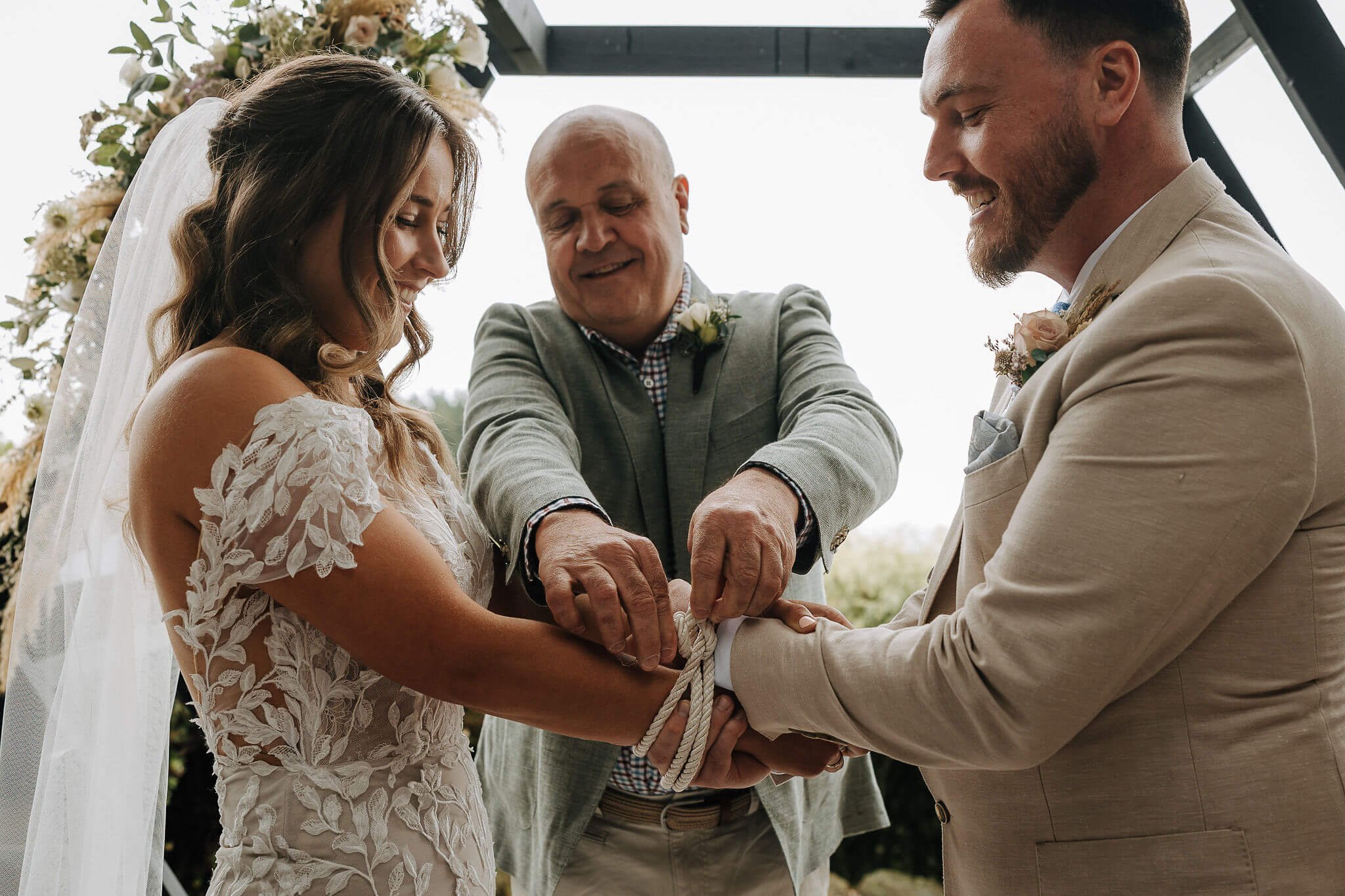 Personalised wedding details including hand fasting